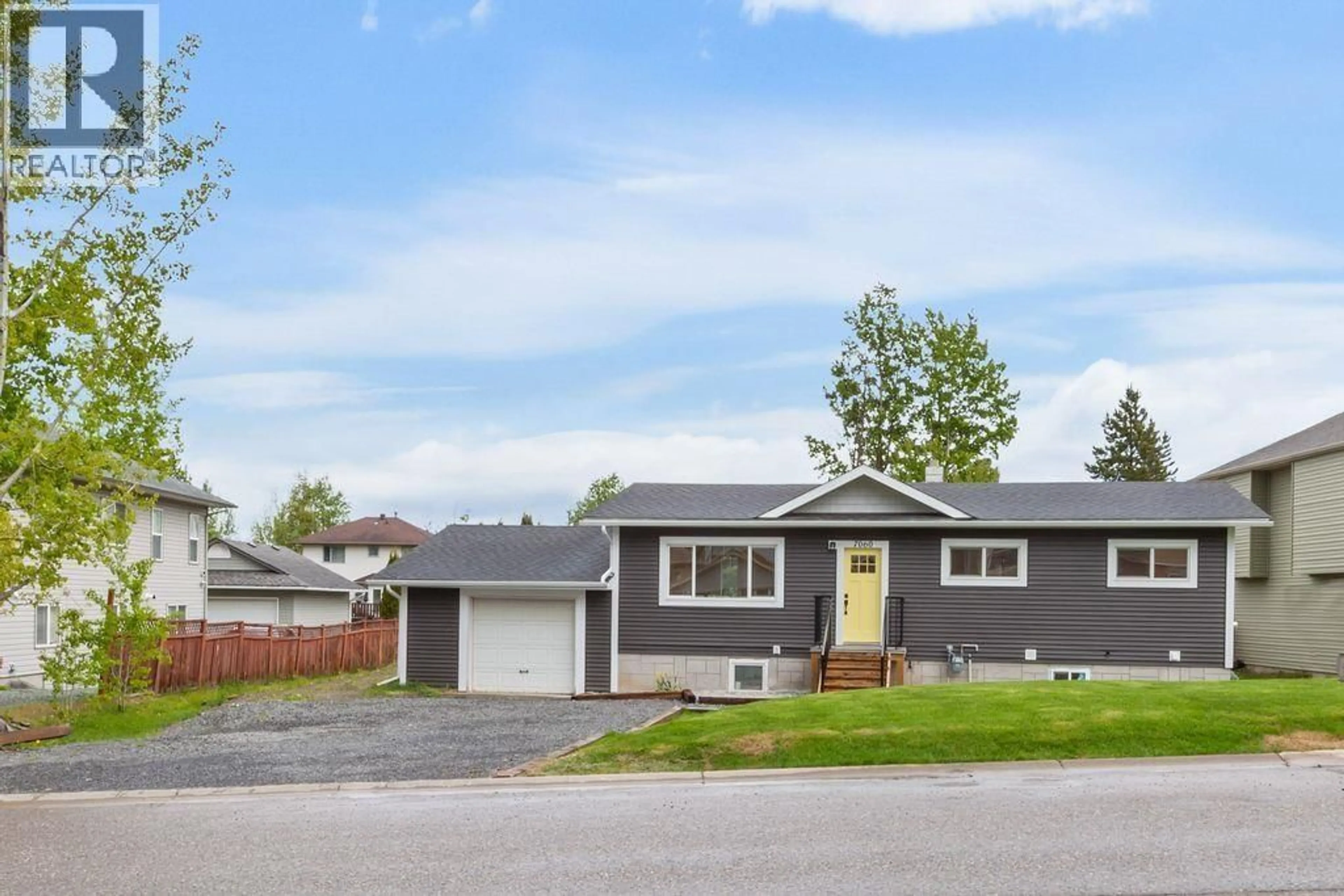 Home with vinyl exterior material, street for 7060 EUGENE ROAD, Prince George British Columbia V2N5P6