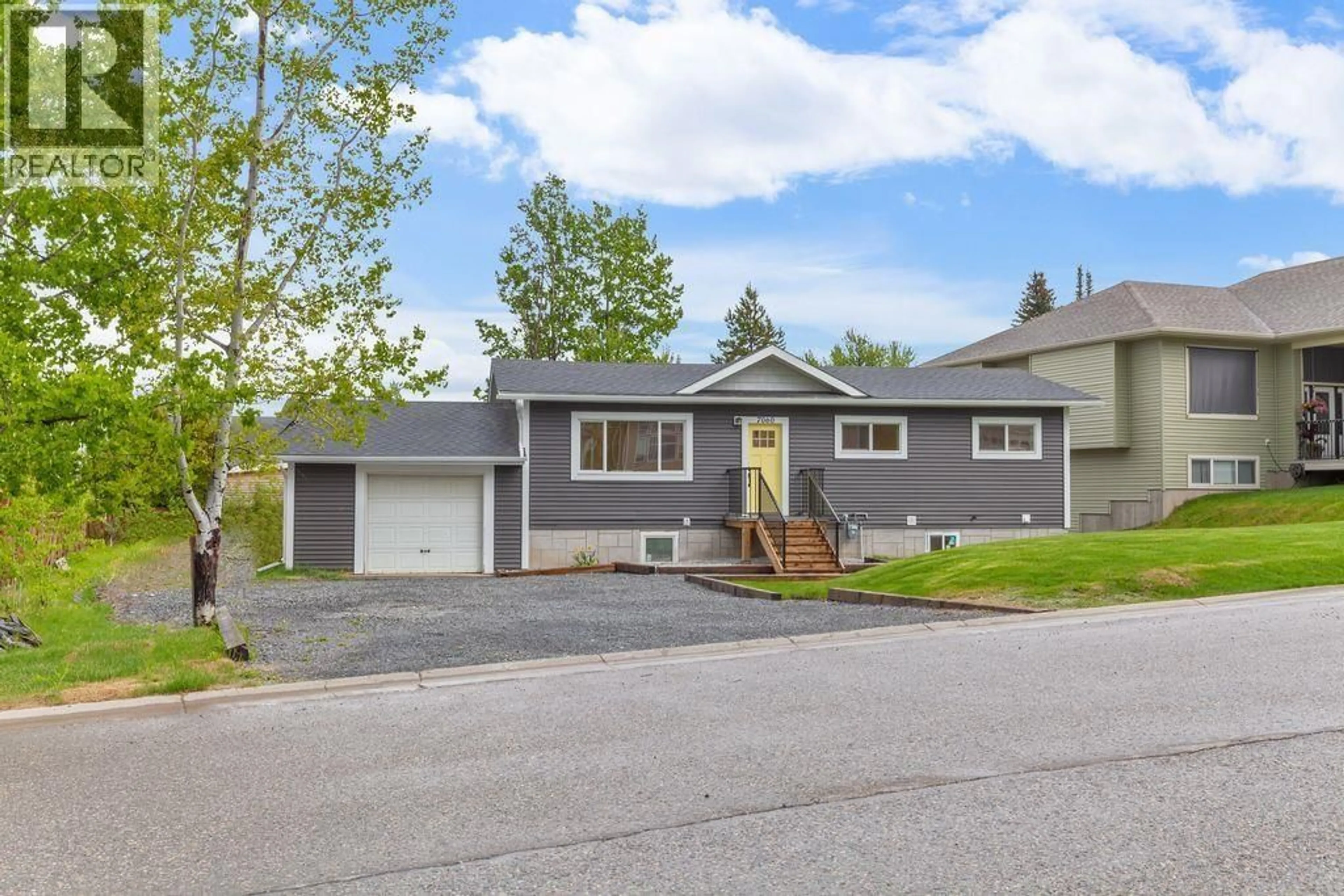 Home with vinyl exterior material, street for 7060 EUGENE ROAD, Prince George British Columbia V2N5P6