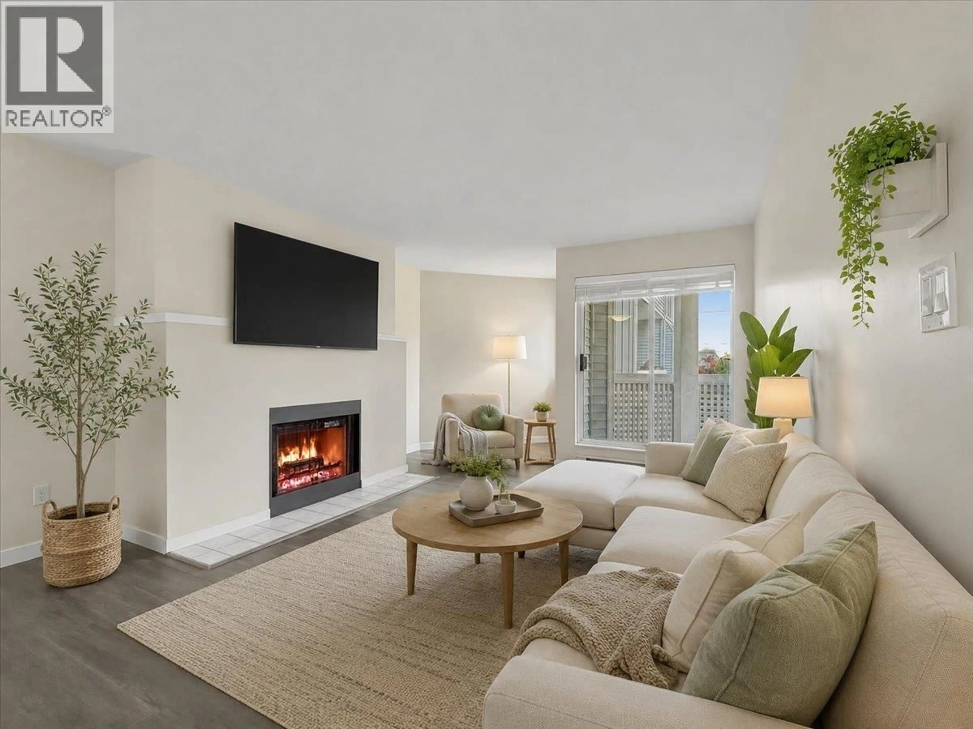 Living room with furniture, unknown for 201 - 7431 BLUNDELL ROAD, Richmond British Columbia V6Y3G8