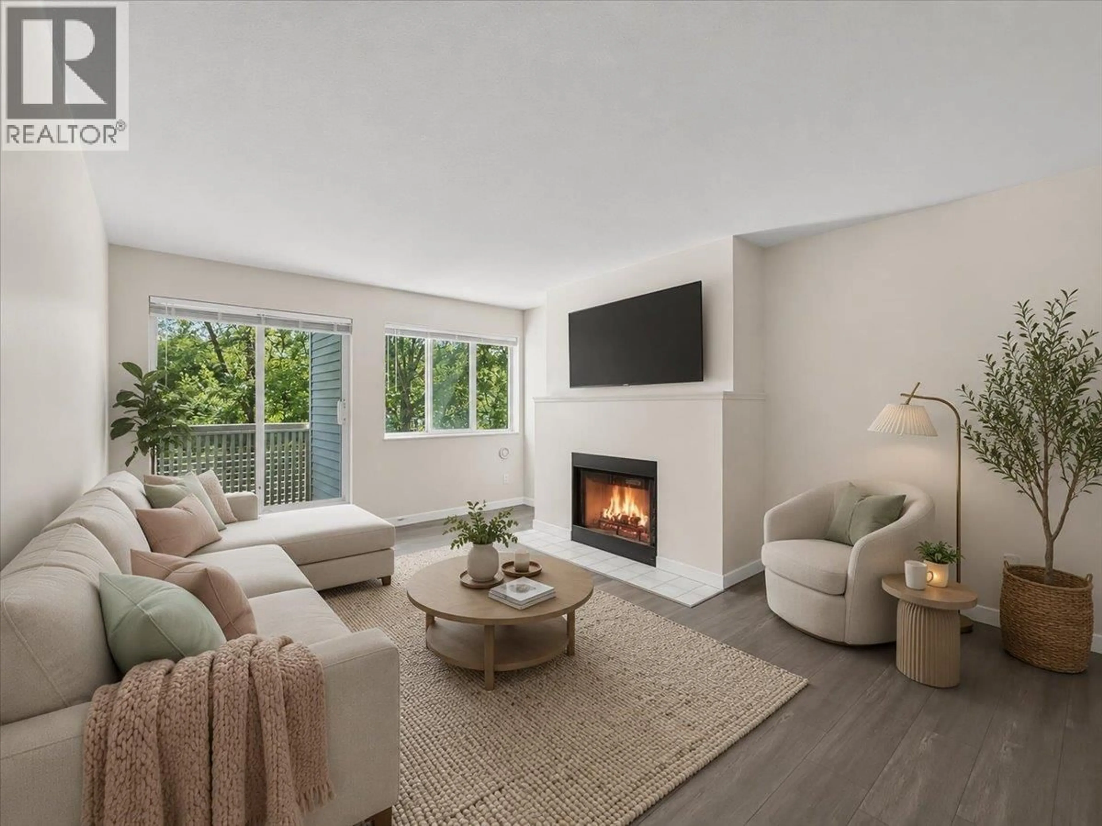 Living room with furniture, unknown for 204 - 7431 BLUNDELL ROAD, Richmond British Columbia V6Y3G8