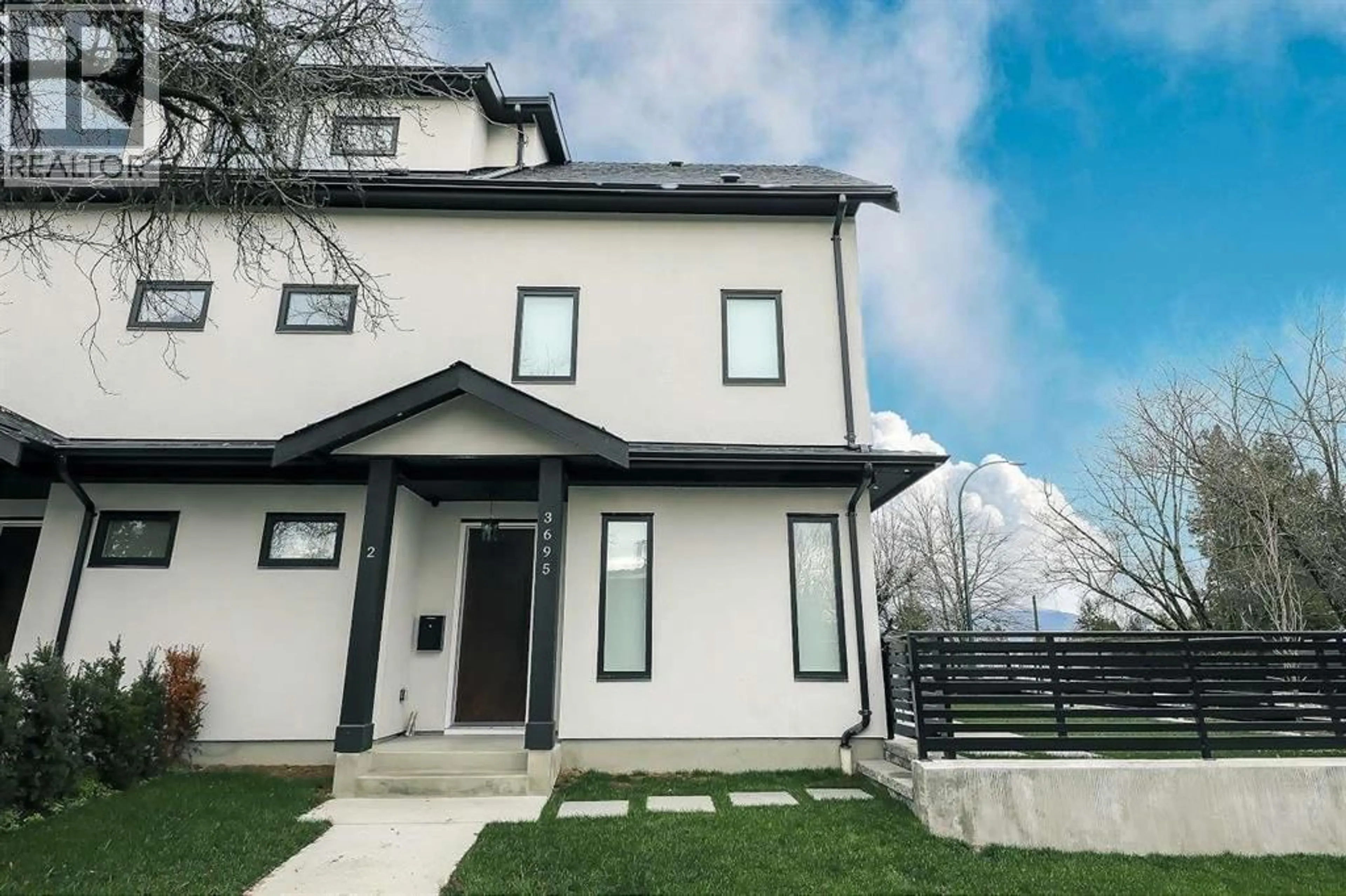 Home with vinyl exterior material, mountain view for 2 - 3695 26 AVENUE, Vancouver British Columbia V5R2M7