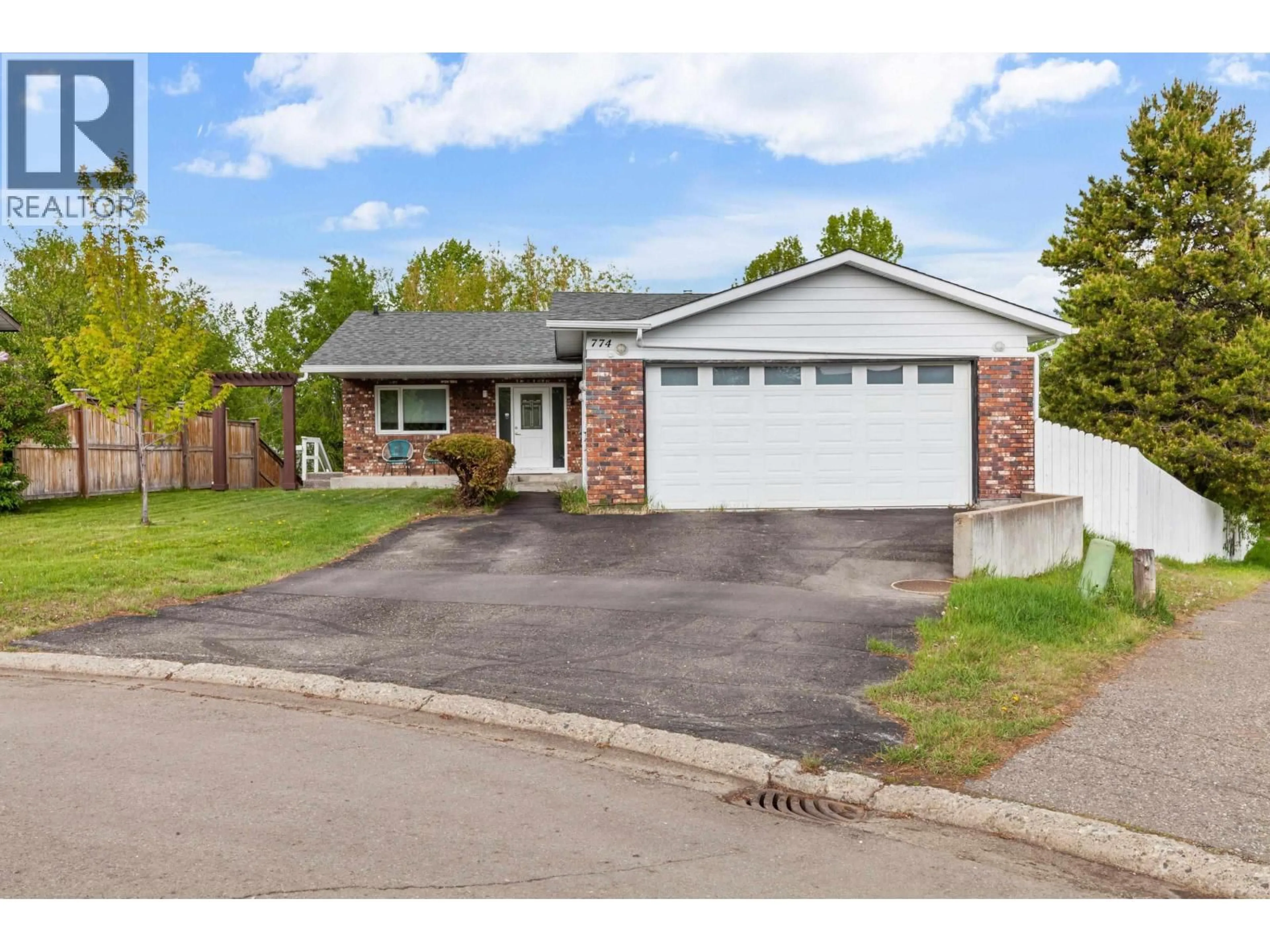 Home with brick exterior material, street for 774 OCHAKWIN CRESCENT, Prince George British Columbia V2M5P3