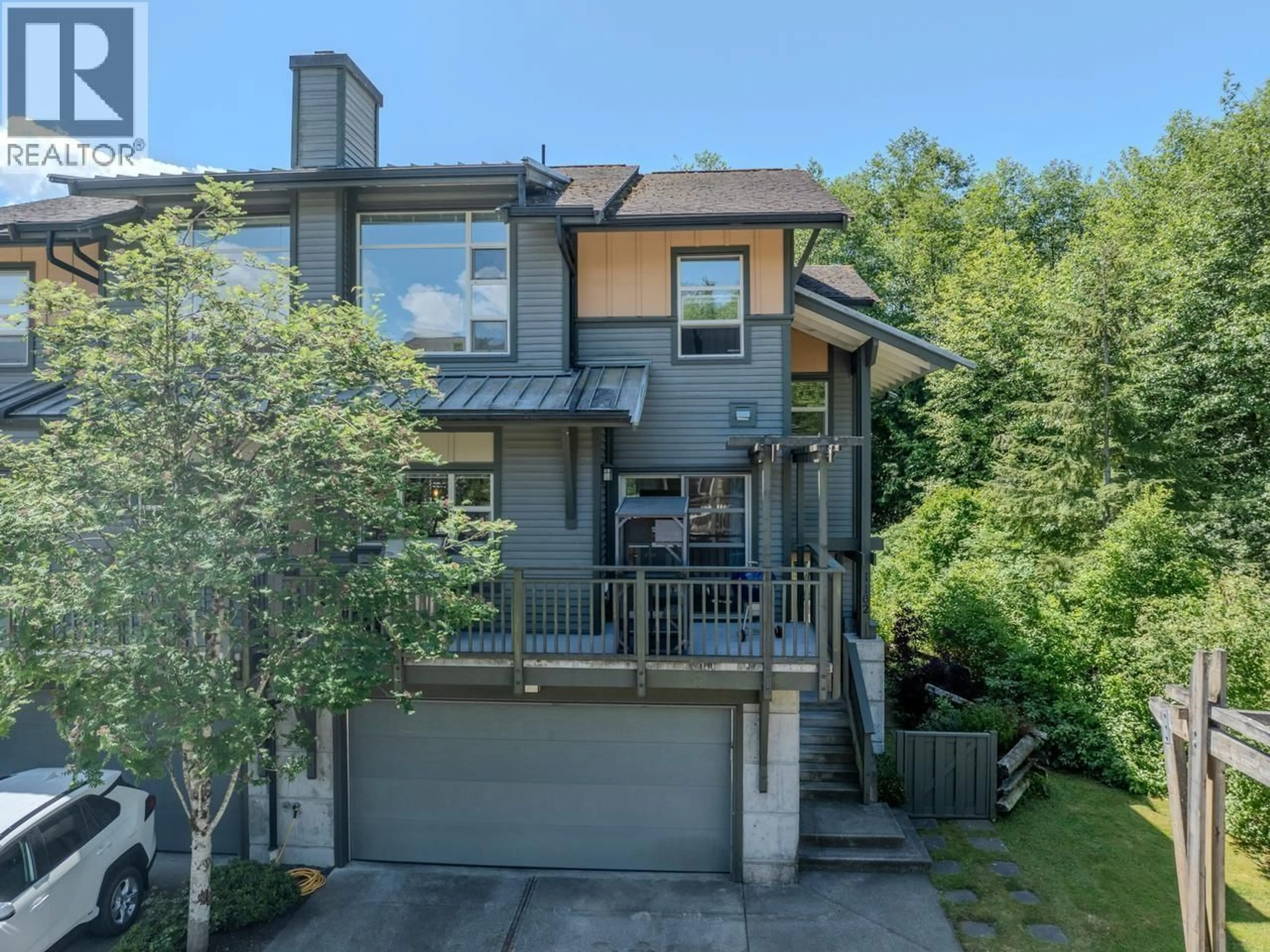 A pic from outside/outdoor area/front of a property/back of a property/a pic from drone, street for 1162 VILLAGE GREEN WAY, Squamish British Columbia V8B0A9