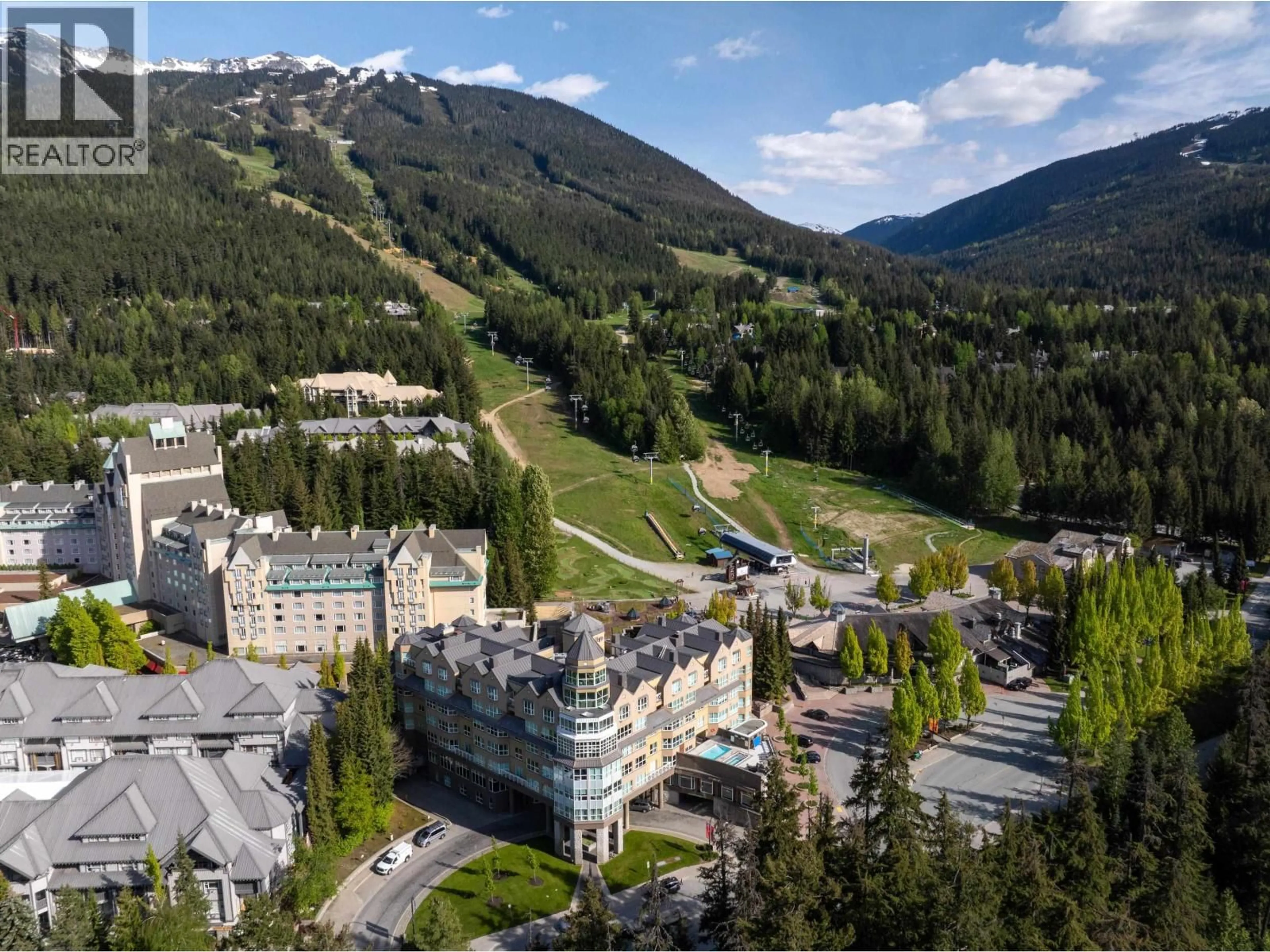 A pic from outside/outdoor area/front of a property/back of a property/a pic from drone, mountain view for 310 - 4557 BLACKCOMB WAY, Whistler British Columbia V8E0Y2