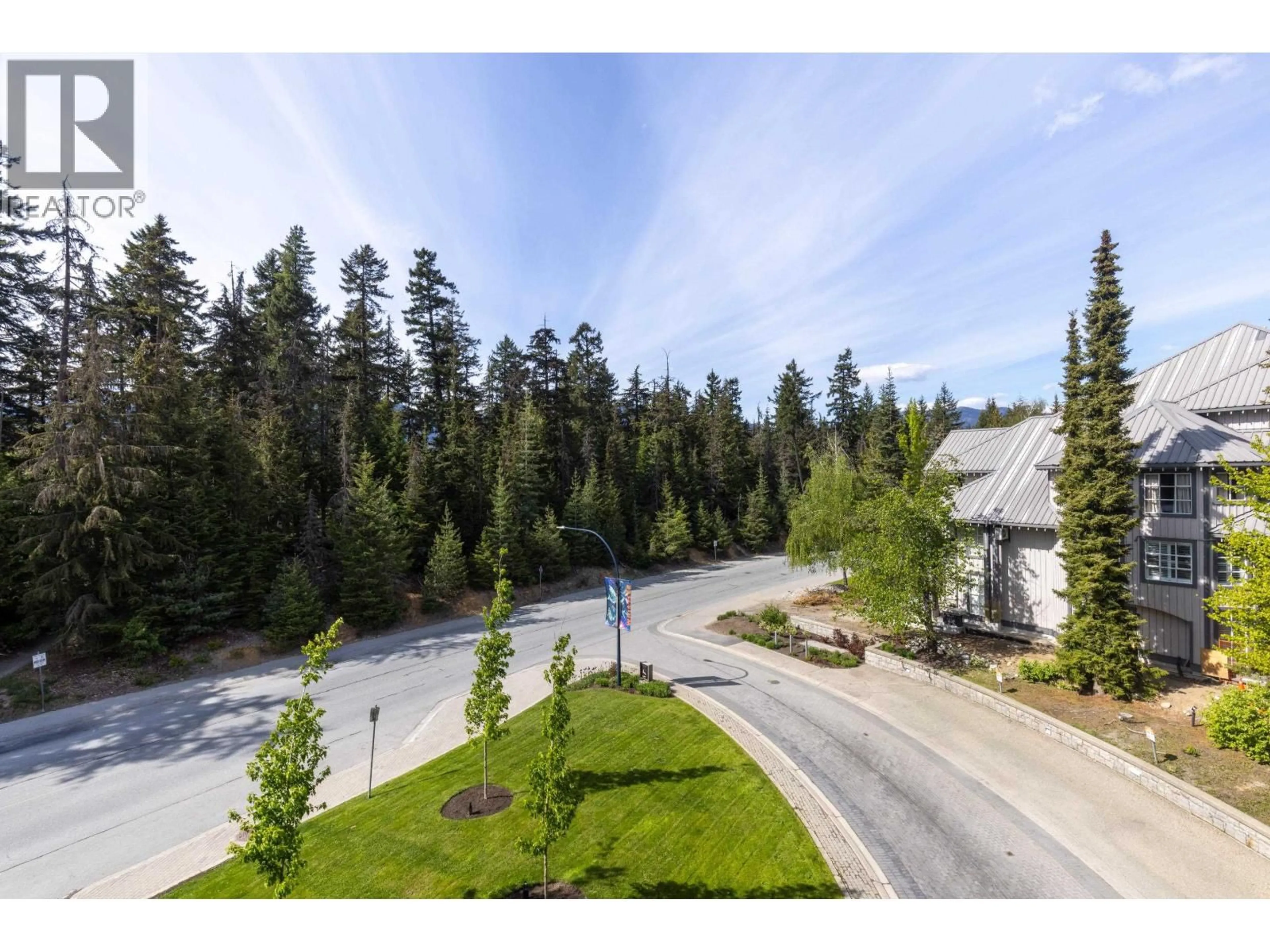 A pic from outside/outdoor area/front of a property/back of a property/a pic from drone, forest/trees view for 310 - 4557 BLACKCOMB WAY, Whistler British Columbia V8E0Y2