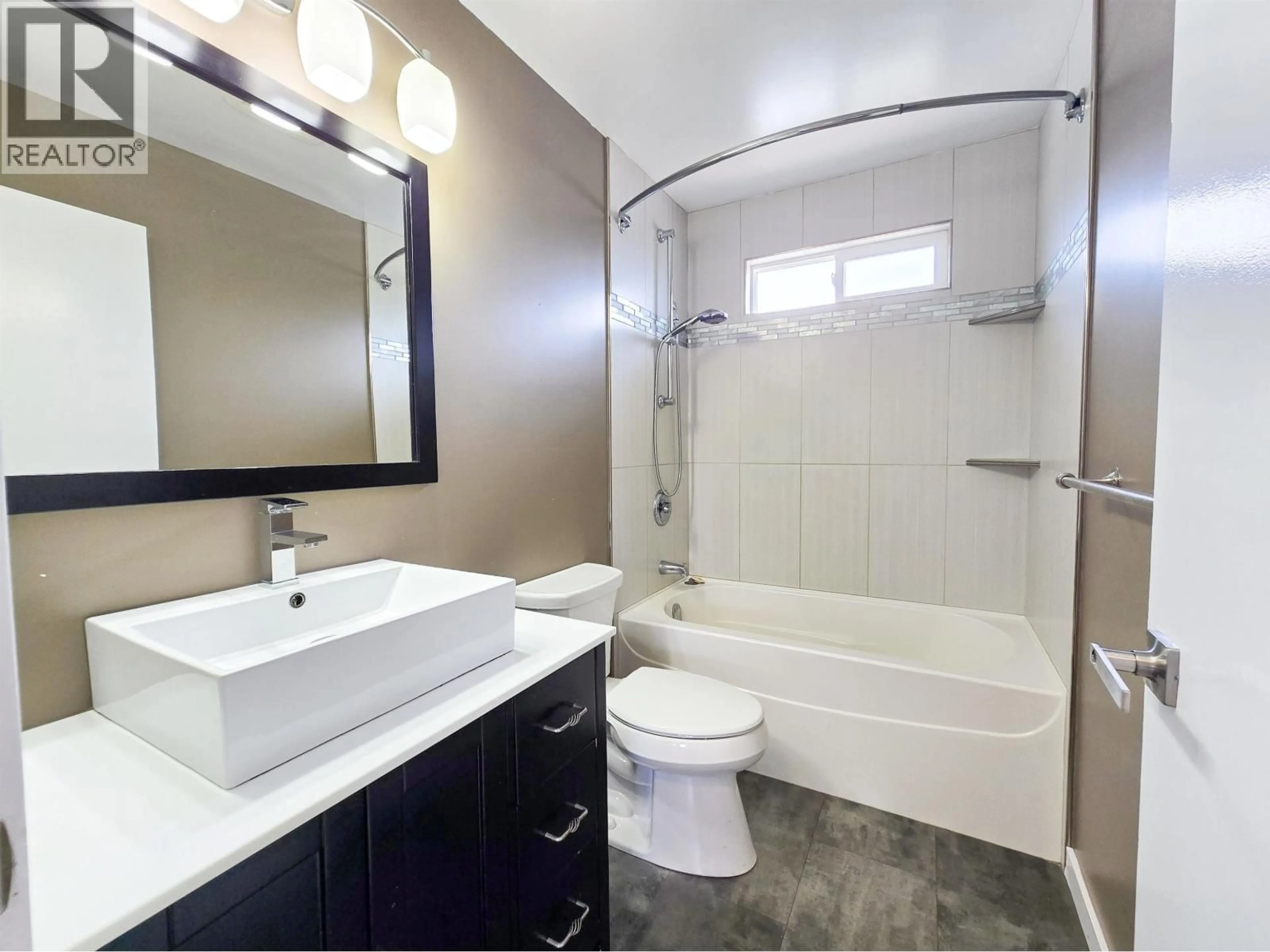 Standard bathroom, ceramic/tile floor for 23 STEIN STREET, Kitimat British Columbia V8C1J2