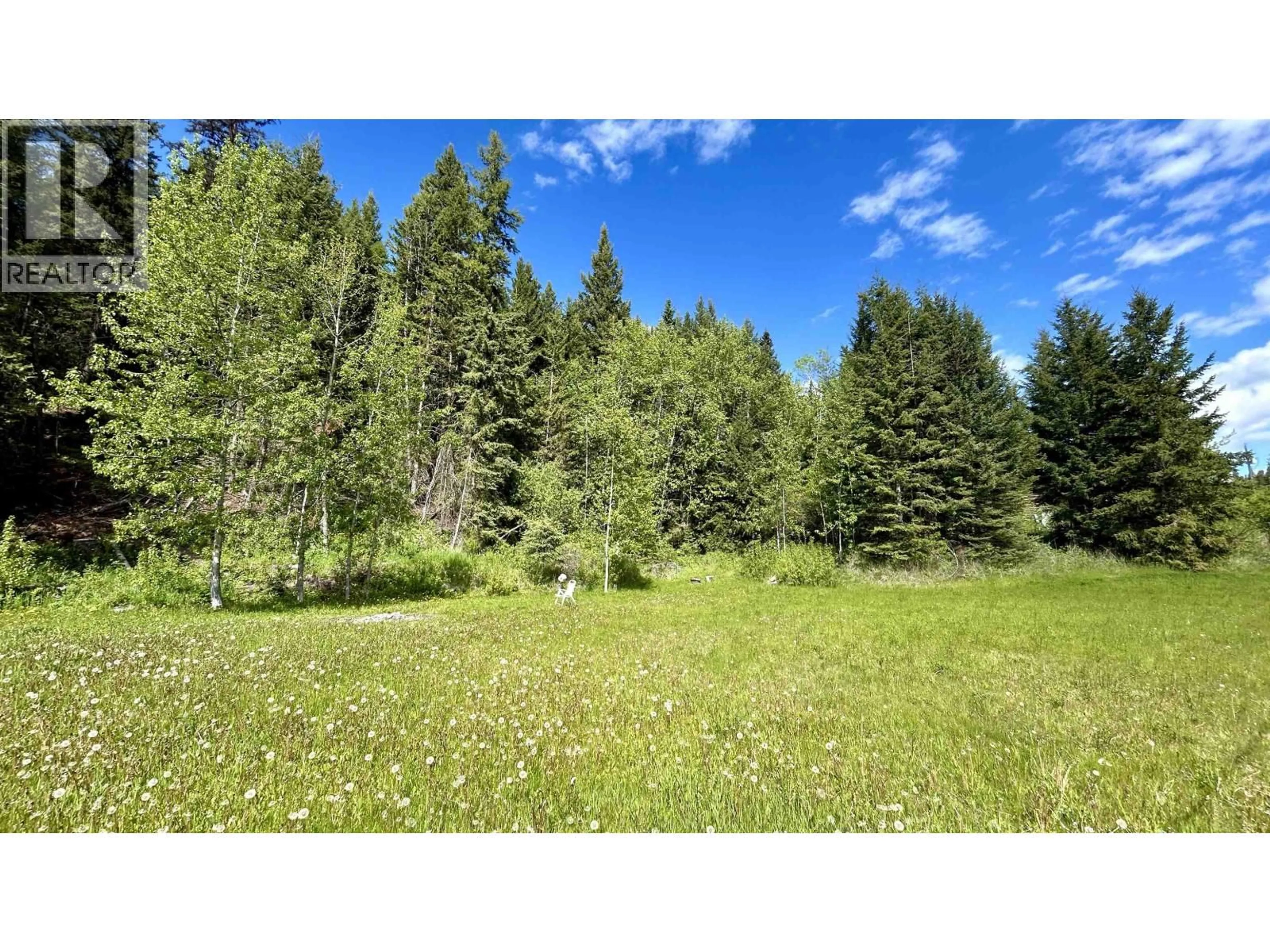 A pic from outside/outdoor area/front of a property/back of a property/a pic from drone, forest/trees view for 7554 BRIDGE LAKE BUSINESS RTE, Bridge Lake British Columbia V0K1E0