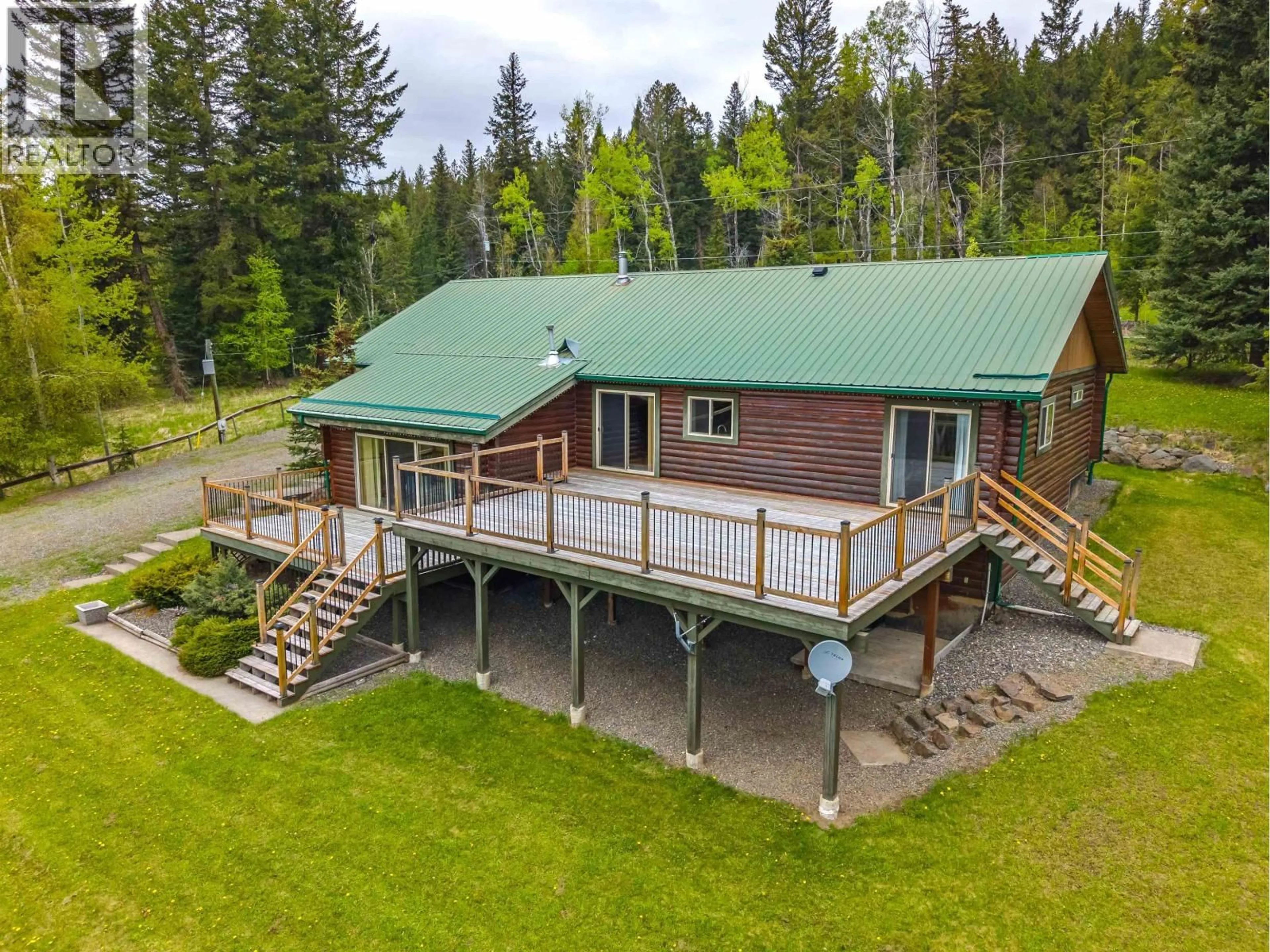 A pic from outside/outdoor area/front of a property/back of a property/a pic from drone, water/lake/river/ocean view for 7118 NOVETA ROAD, Bridge Lake British Columbia V0K1X2
