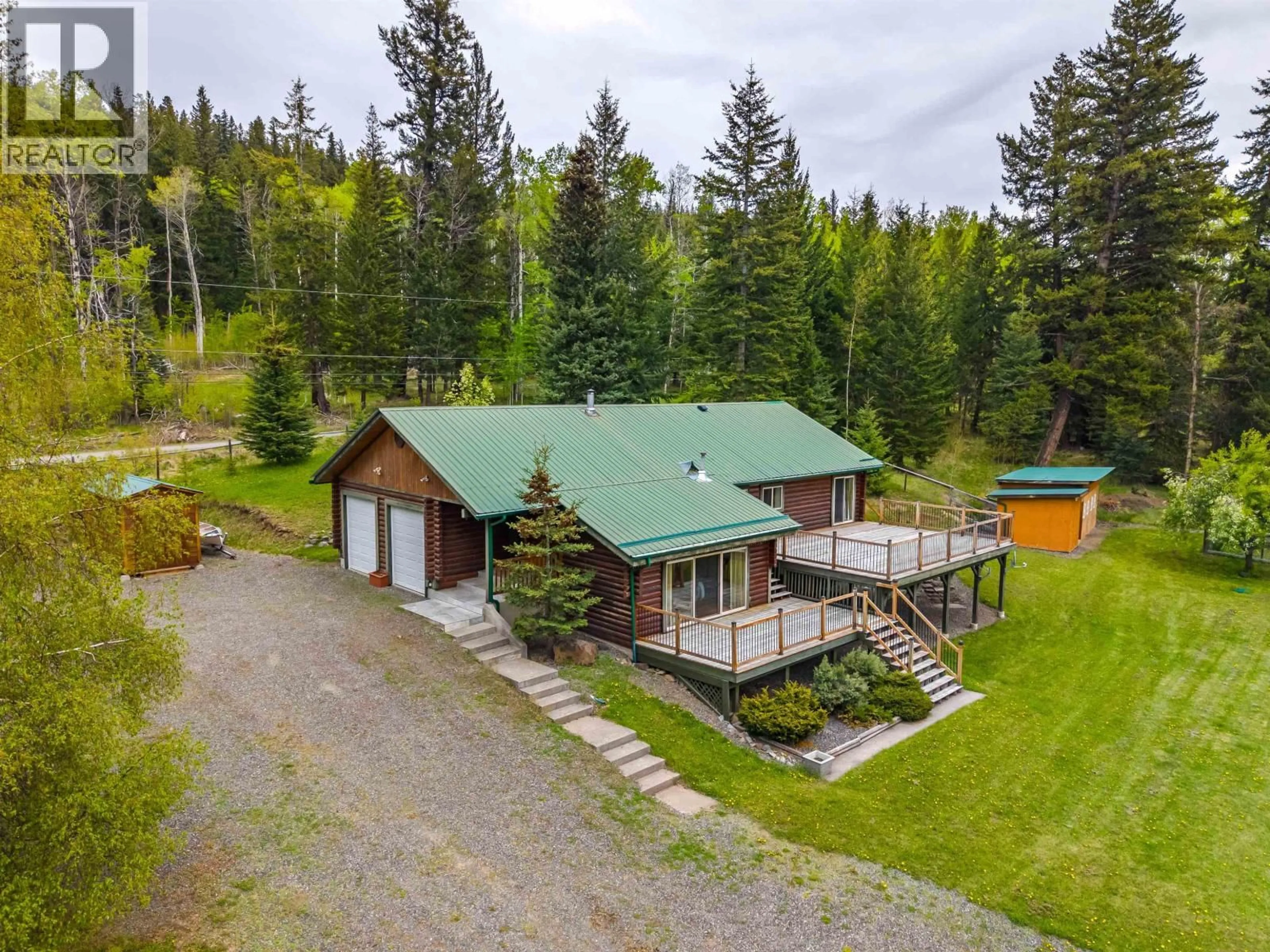 A pic from outside/outdoor area/front of a property/back of a property/a pic from drone, mountain view for 7118 NOVETA ROAD, Bridge Lake British Columbia V0K1X2