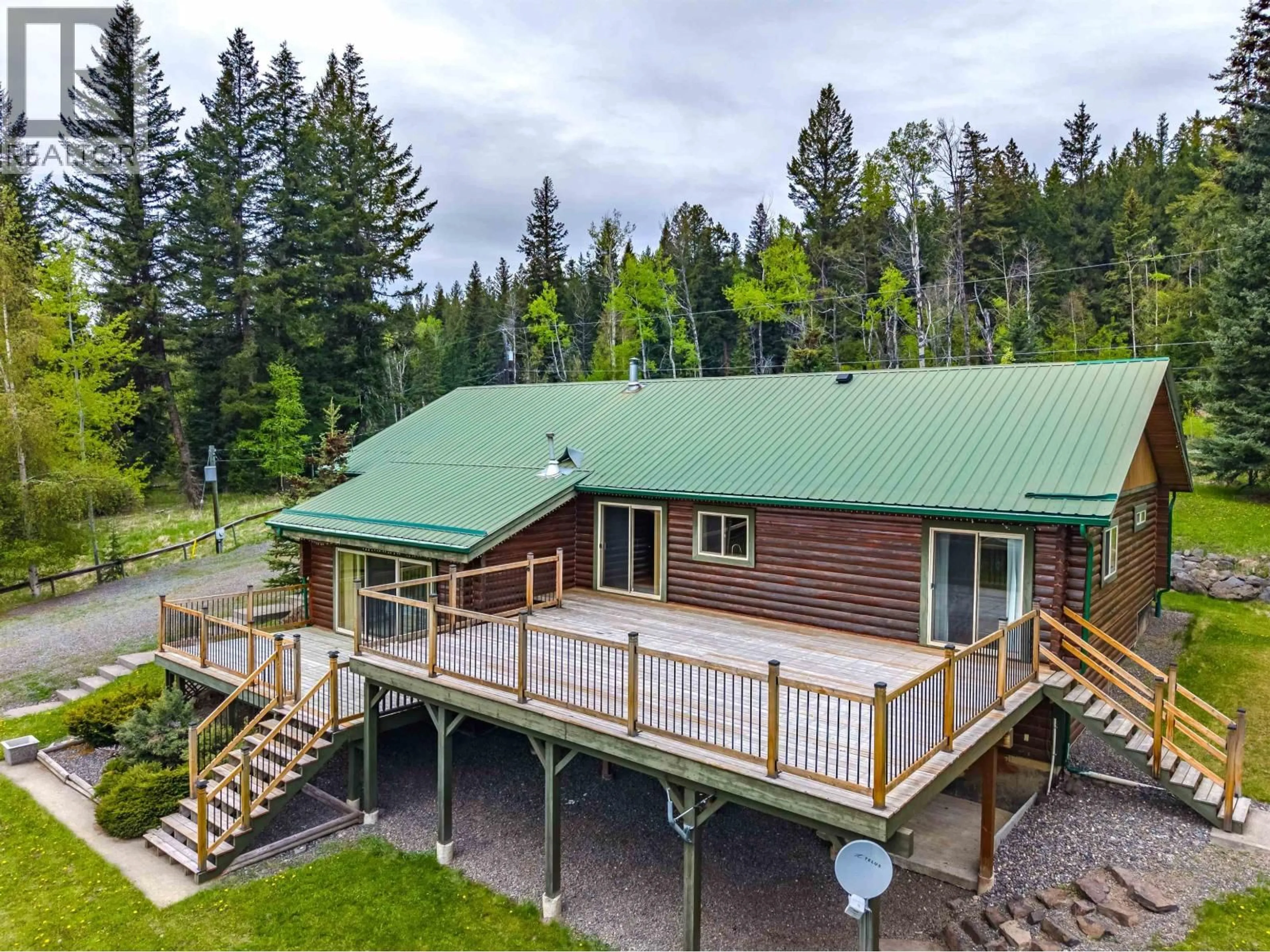 A pic from outside/outdoor area/front of a property/back of a property/a pic from drone, unknown for 7118 NOVETA ROAD, Bridge Lake British Columbia V0K1X2