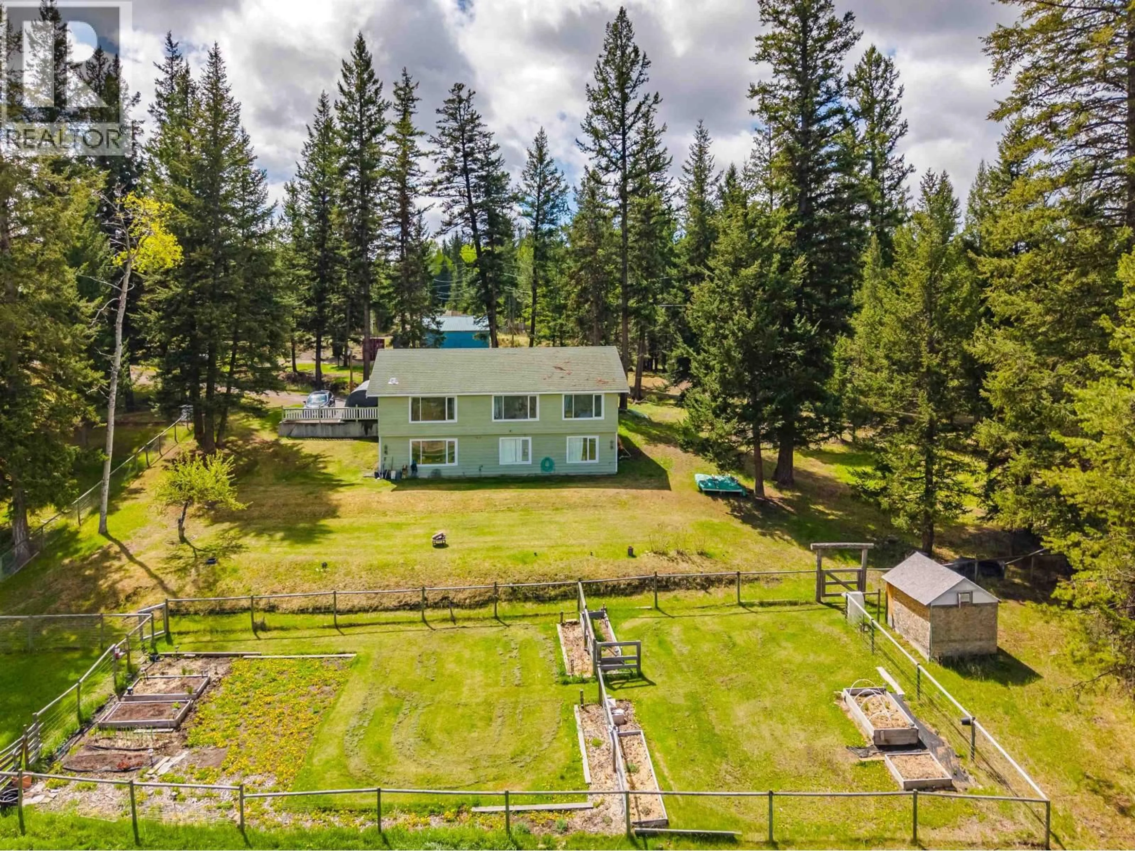A pic from outside/outdoor area/front of a property/back of a property/a pic from drone, unknown for 6017 TOOMEY ROAD, 100 Mile House British Columbia V0K2E3
