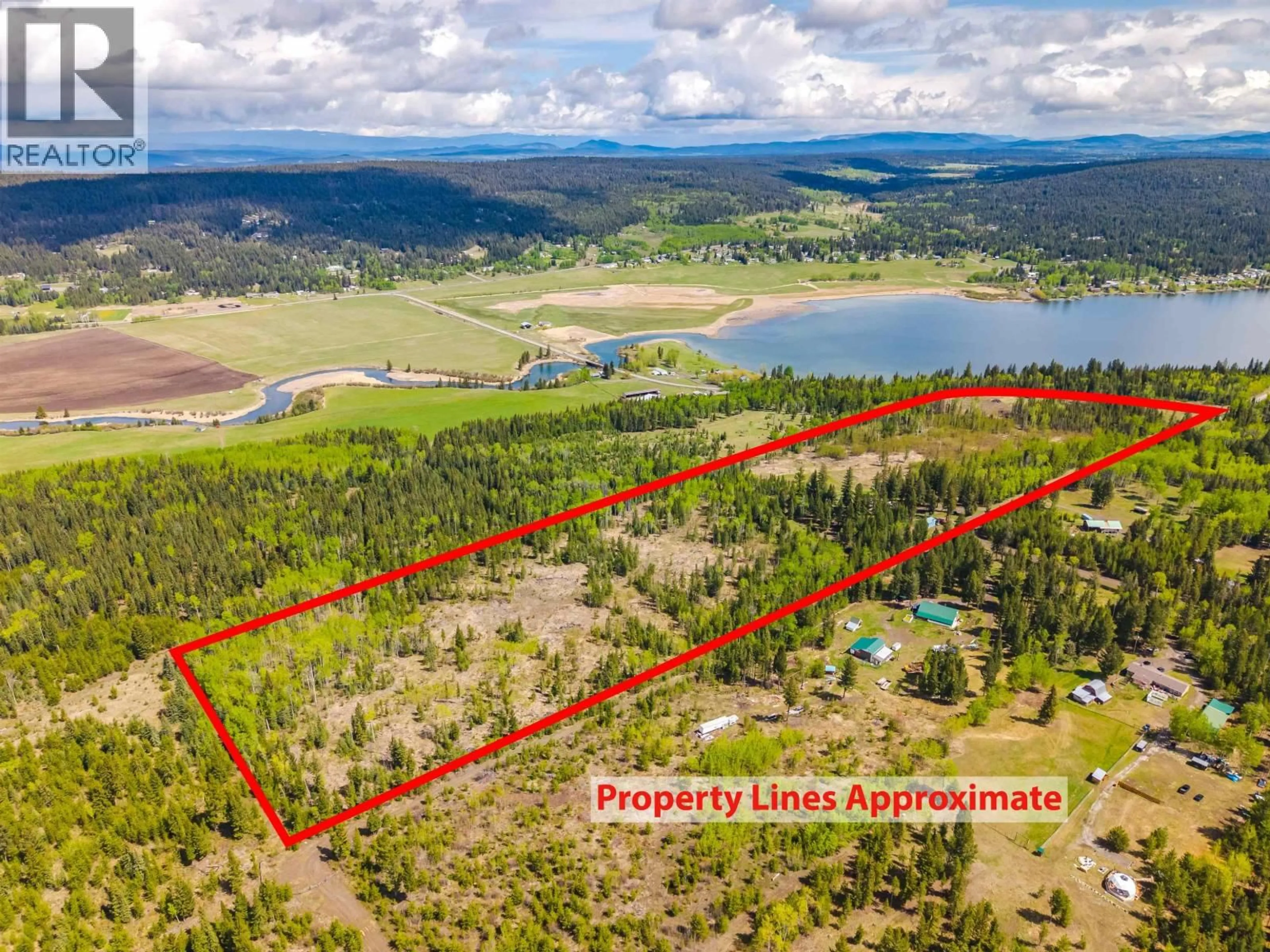A pic from outside/outdoor area/front of a property/back of a property/a pic from drone, water/lake/river/ocean view for 6017 TOOMEY ROAD, 100 Mile House British Columbia V0K2E3