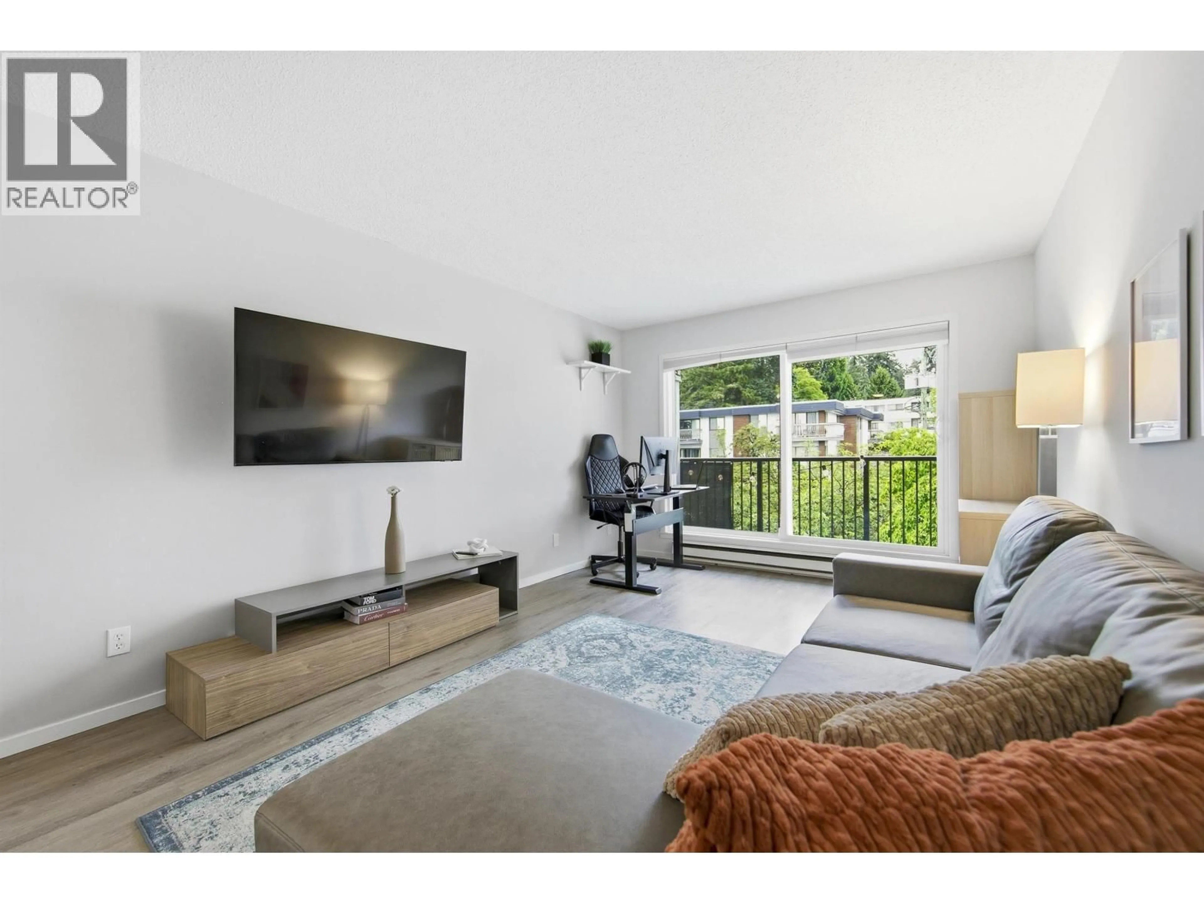 Living room with furniture, unknown for 305 - 1050 HOWIE AVENUE, Coquitlam British Columbia V3J1T6