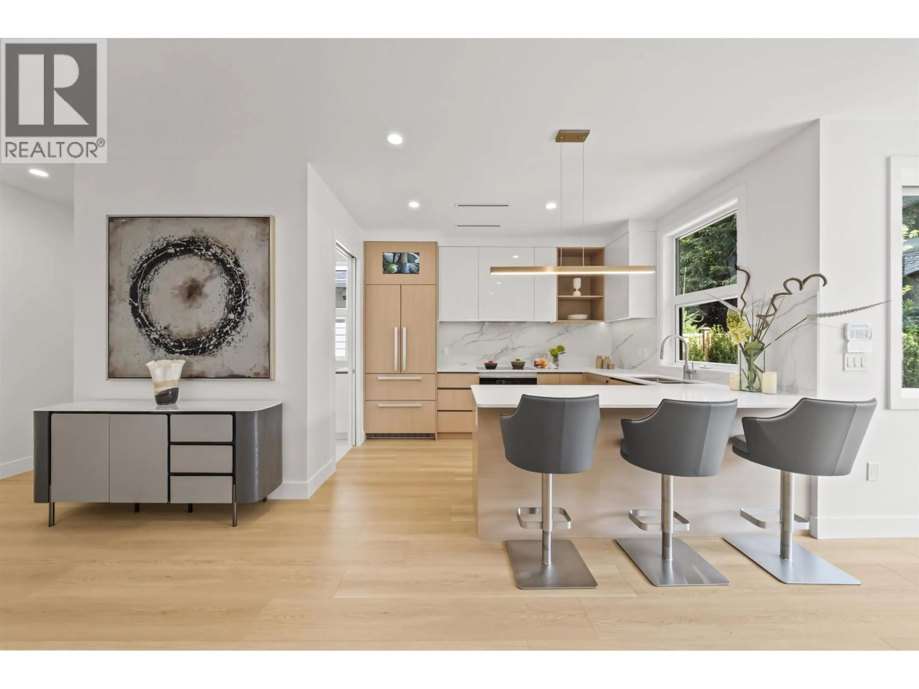 Open concept kitchen, wood/laminate floor for 6706 FRANCIS RD, Richmond British Columbia V7C1K5