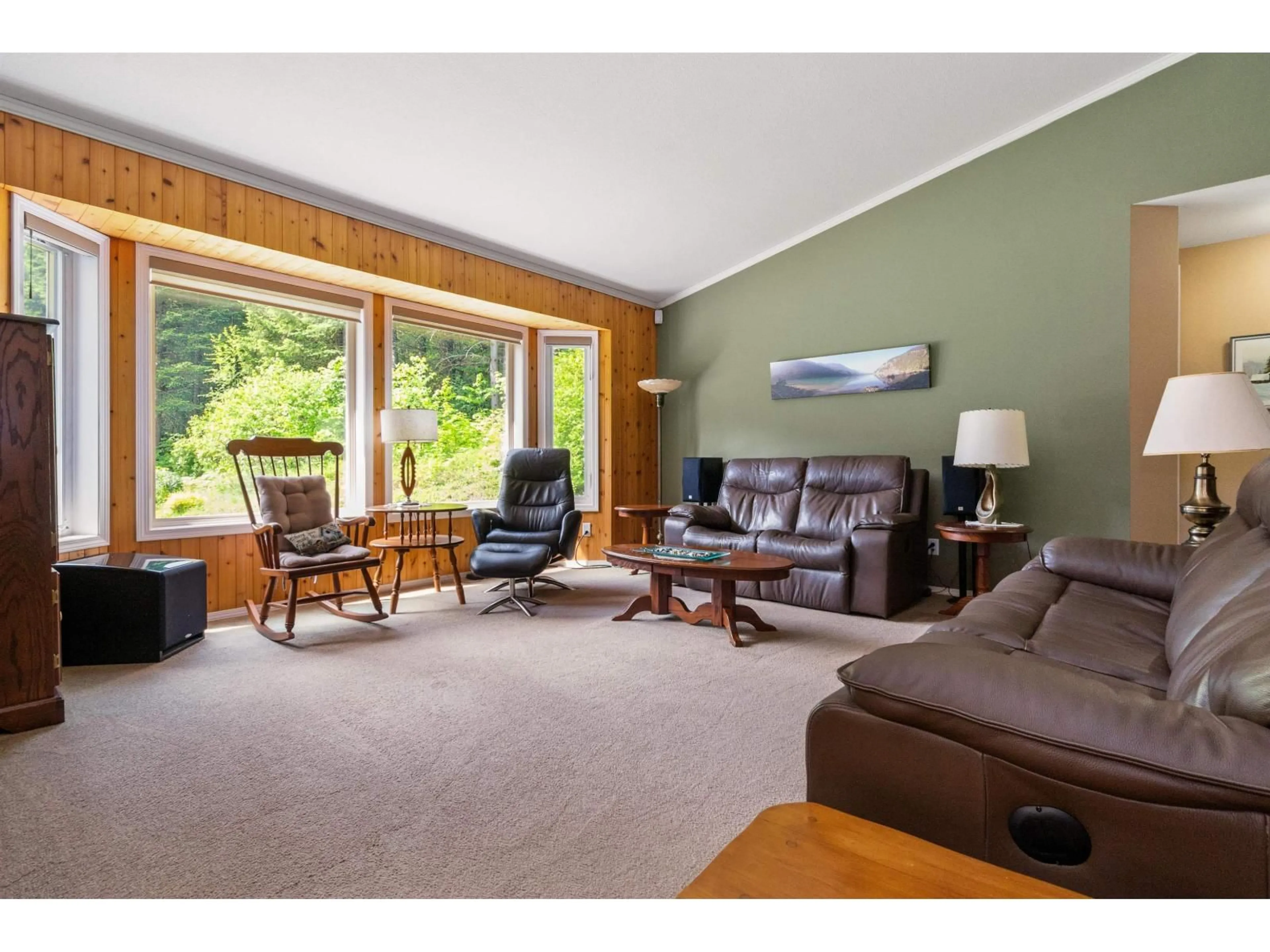 Living room with furniture, wood/laminate floor for 36110 TRANS CANADA HIGHWAY, Yale British Columbia V0K2S1