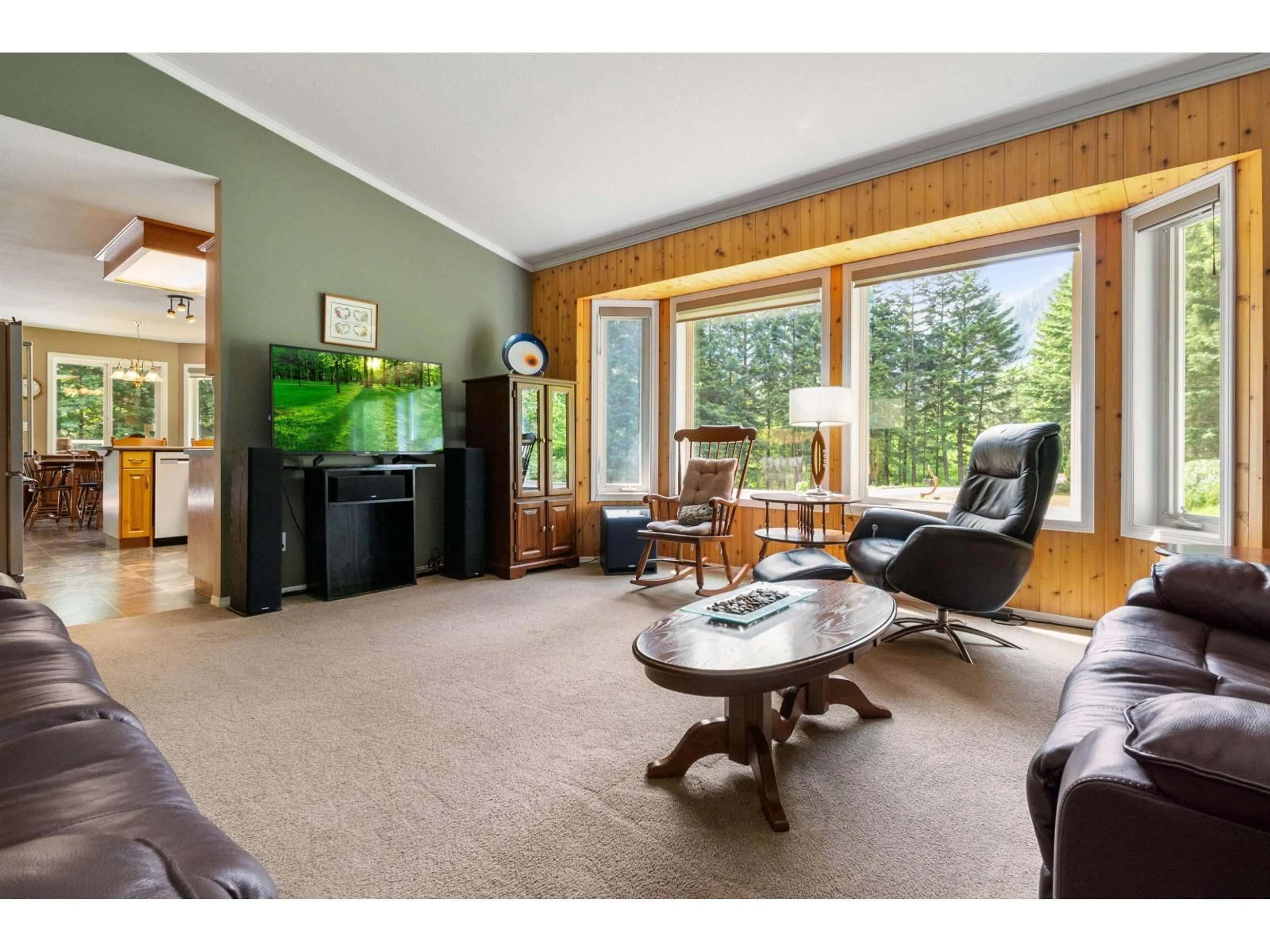 Living room with furniture, wood/laminate floor for 36110 TRANS CANADA HIGHWAY, Yale British Columbia V0K2S1