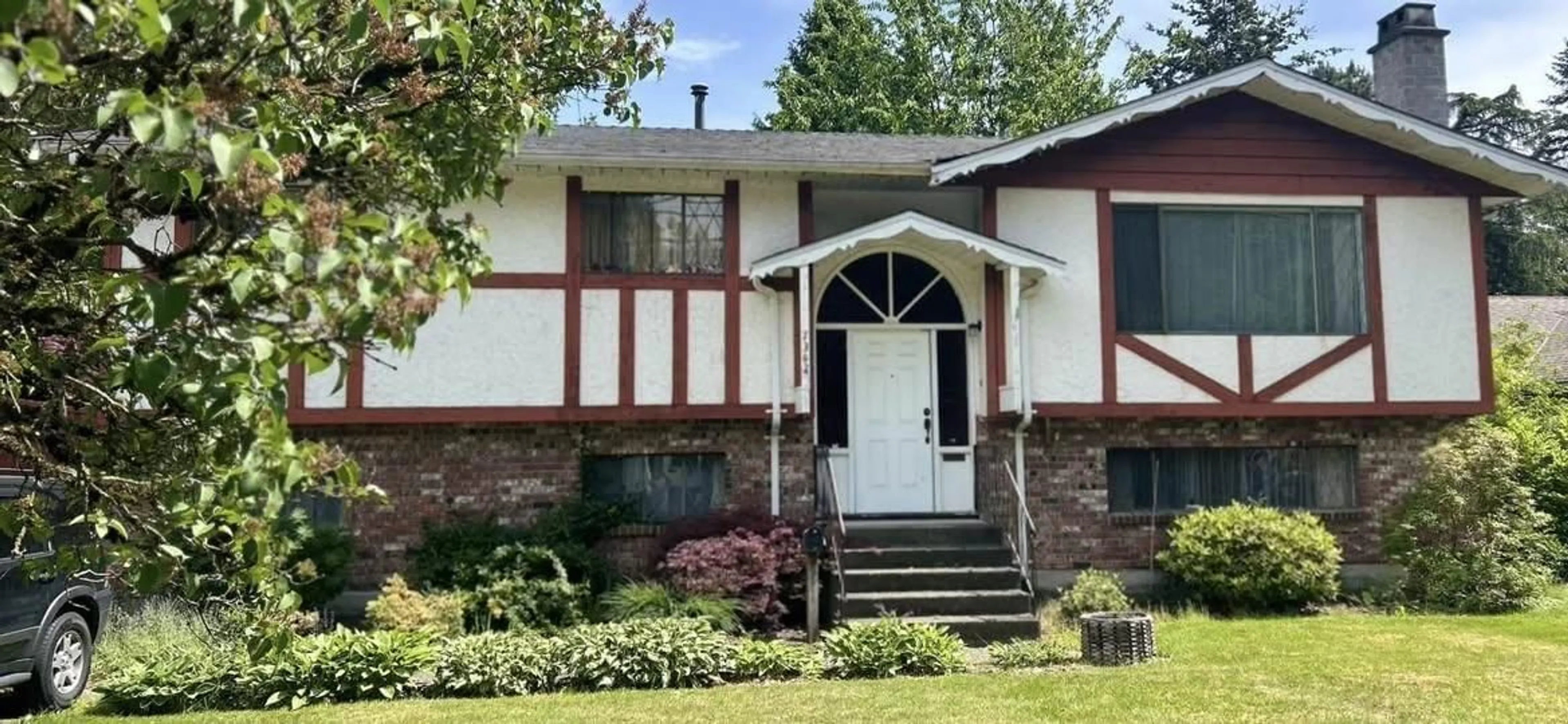 Home with vinyl exterior material, street for 7342 140 STREET, Surrey British Columbia V3W5J7
