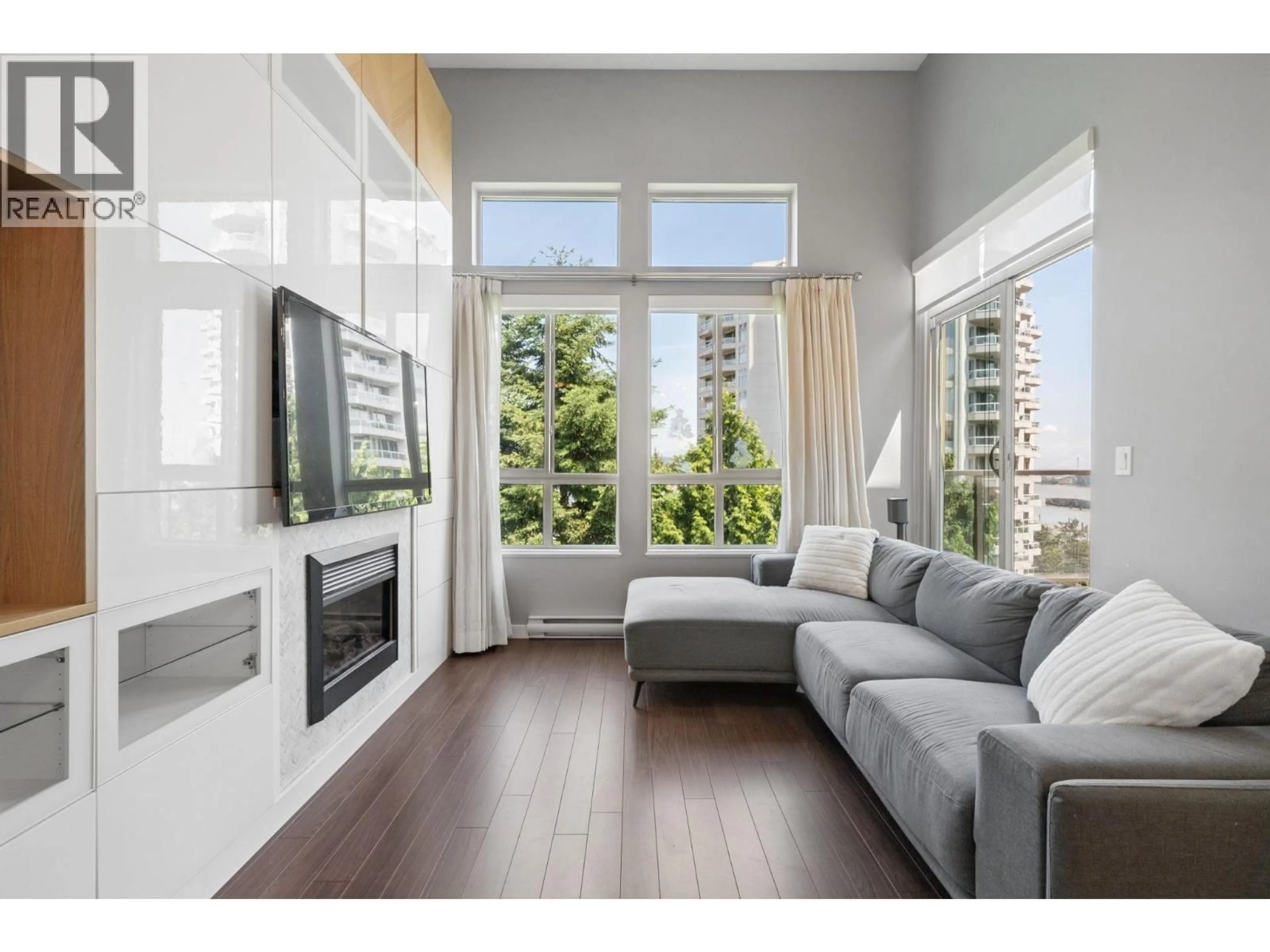 Living room with furniture, unknown for 406 - 225 FRANCIS WAY, New Westminster British Columbia V3L0G1