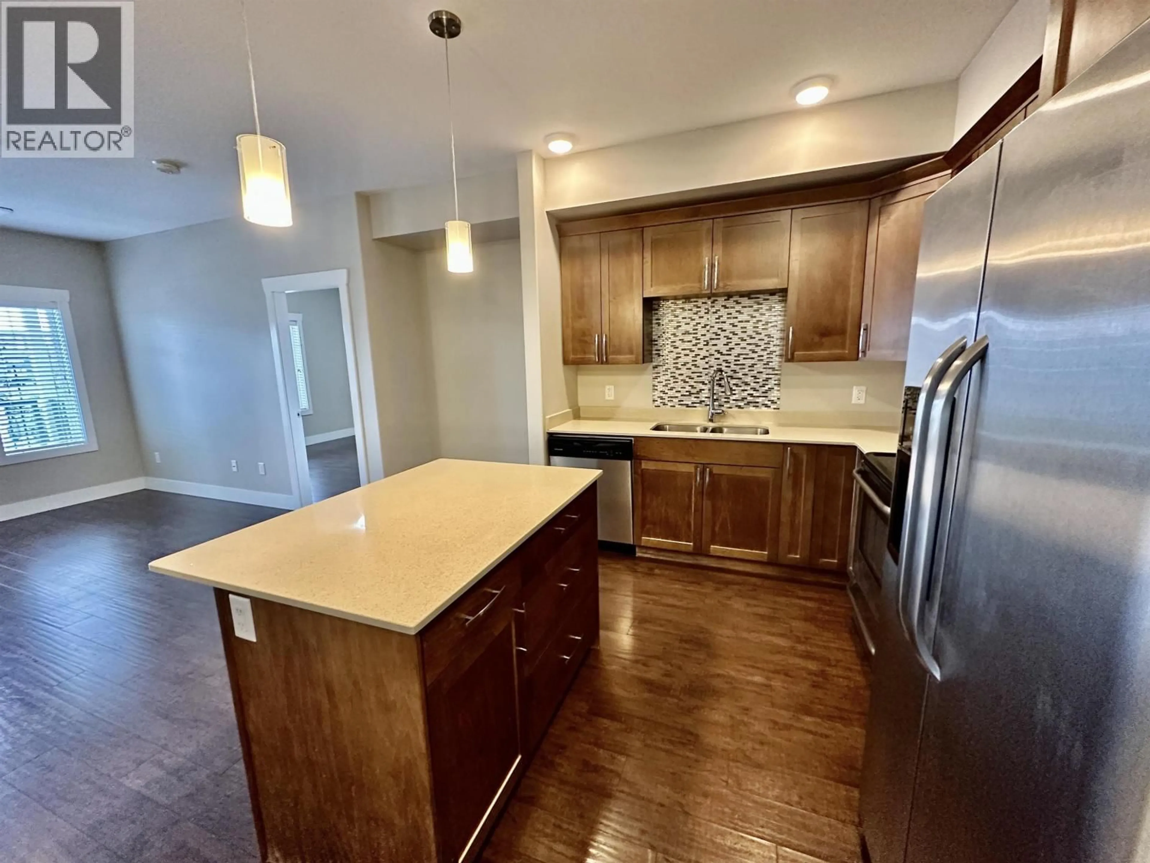 Open concept kitchen, unknown for 212 - 11205 105 AVENUE, Fort St. John British Columbia V1J0L3