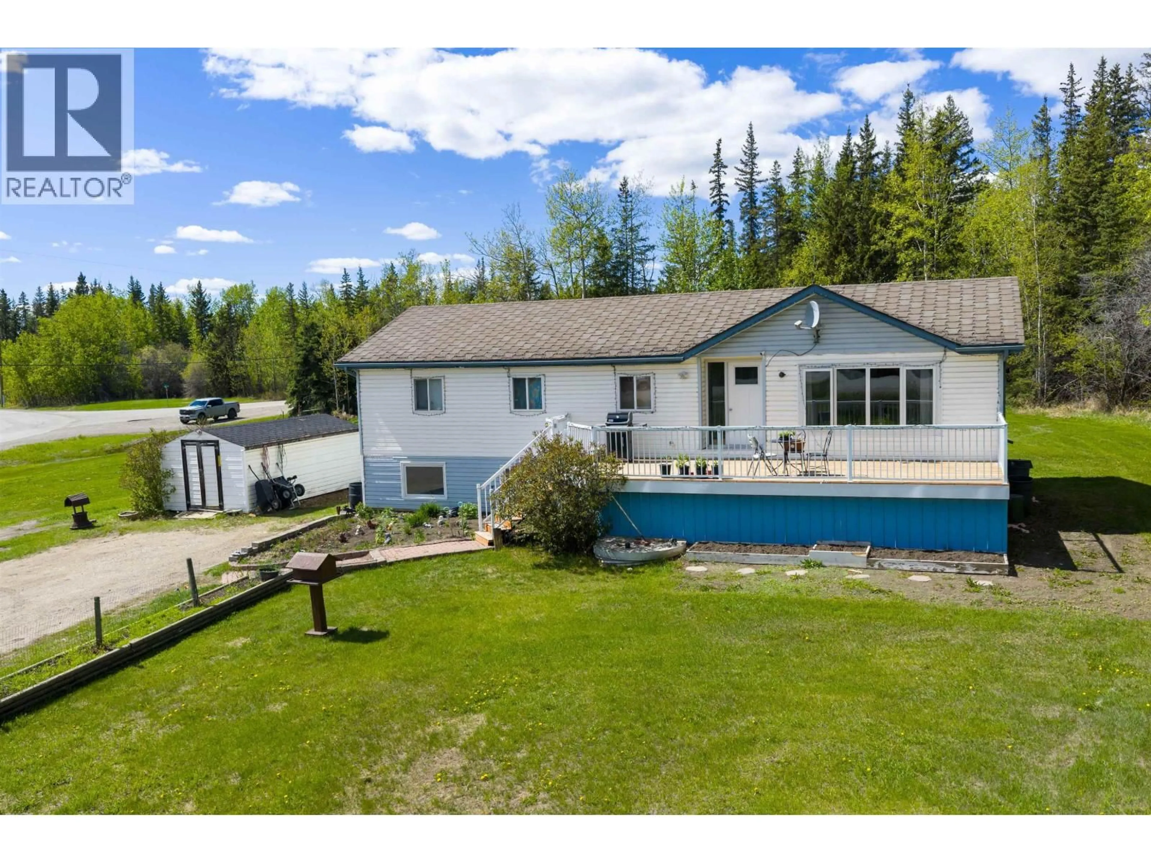 A pic from outside/outdoor area/front of a property/back of a property/a pic from drone, unknown for 13007 BYPASS ROAD, Fort St. John British Columbia V1J8J6