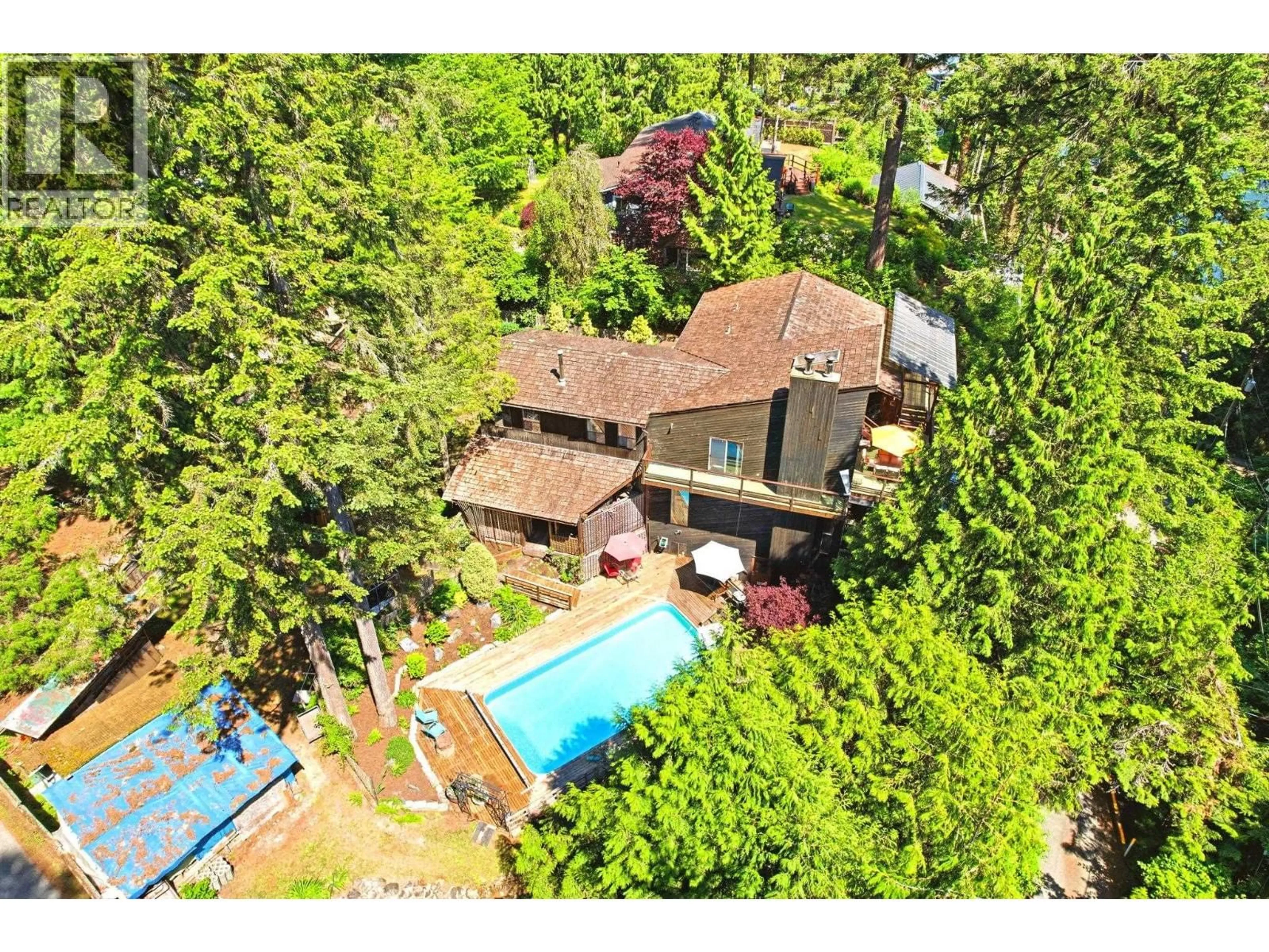 A pic from outside/outdoor area/front of a property/back of a property/a pic from drone, forest/trees view for 5481 INDIAN RIVER DRIVE, North Vancouver British Columbia V7G2T7