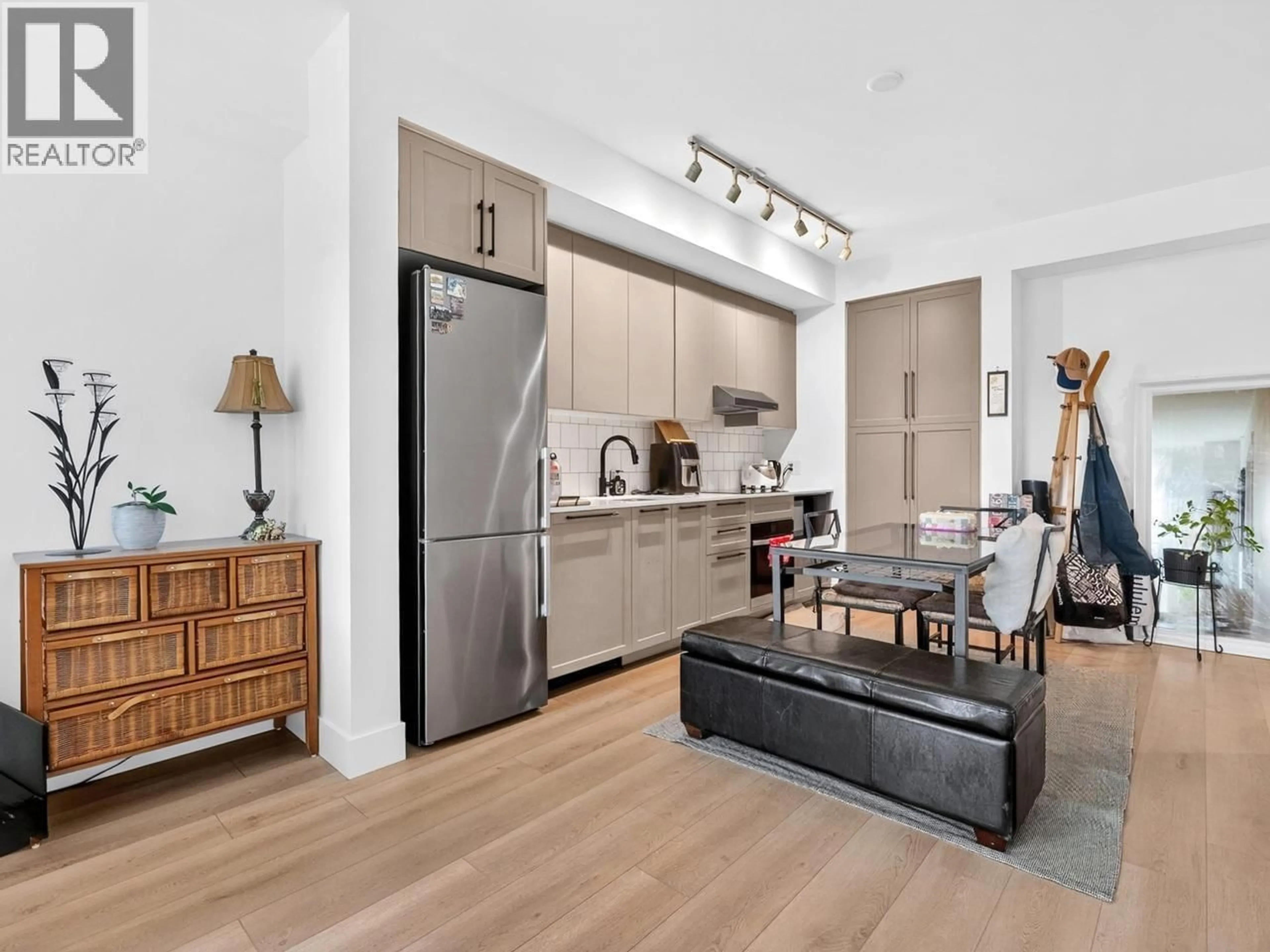 Open concept kitchen, unknown for 202 - 8750 UNIVERSITY CRESCENT, Burnaby British Columbia V5A0G9