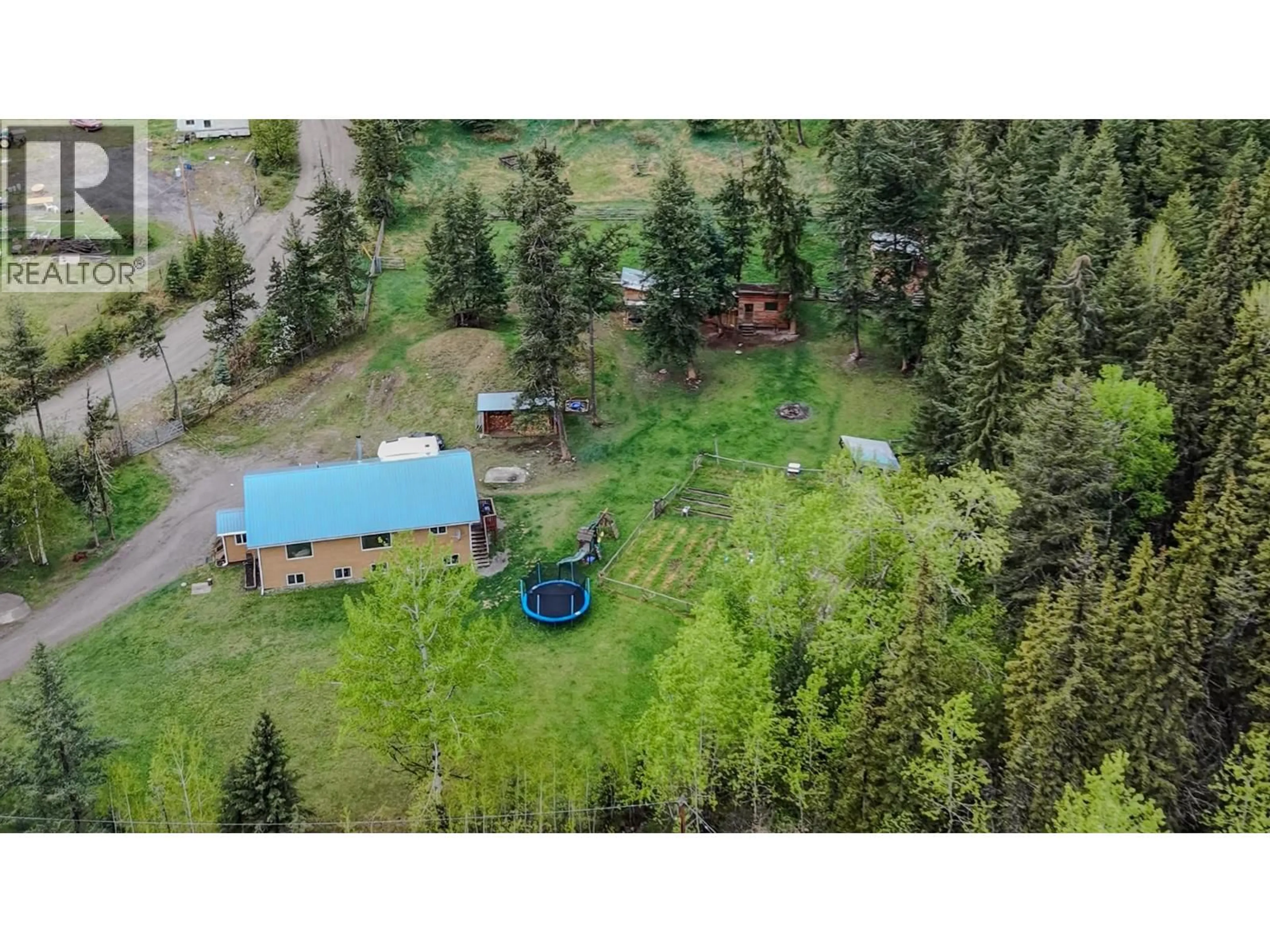A pic from outside/outdoor area/front of a property/back of a property/a pic from drone, forest/trees view for 1449 ENRIGHT ROAD, McLeese Lake British Columbia V0L1P0