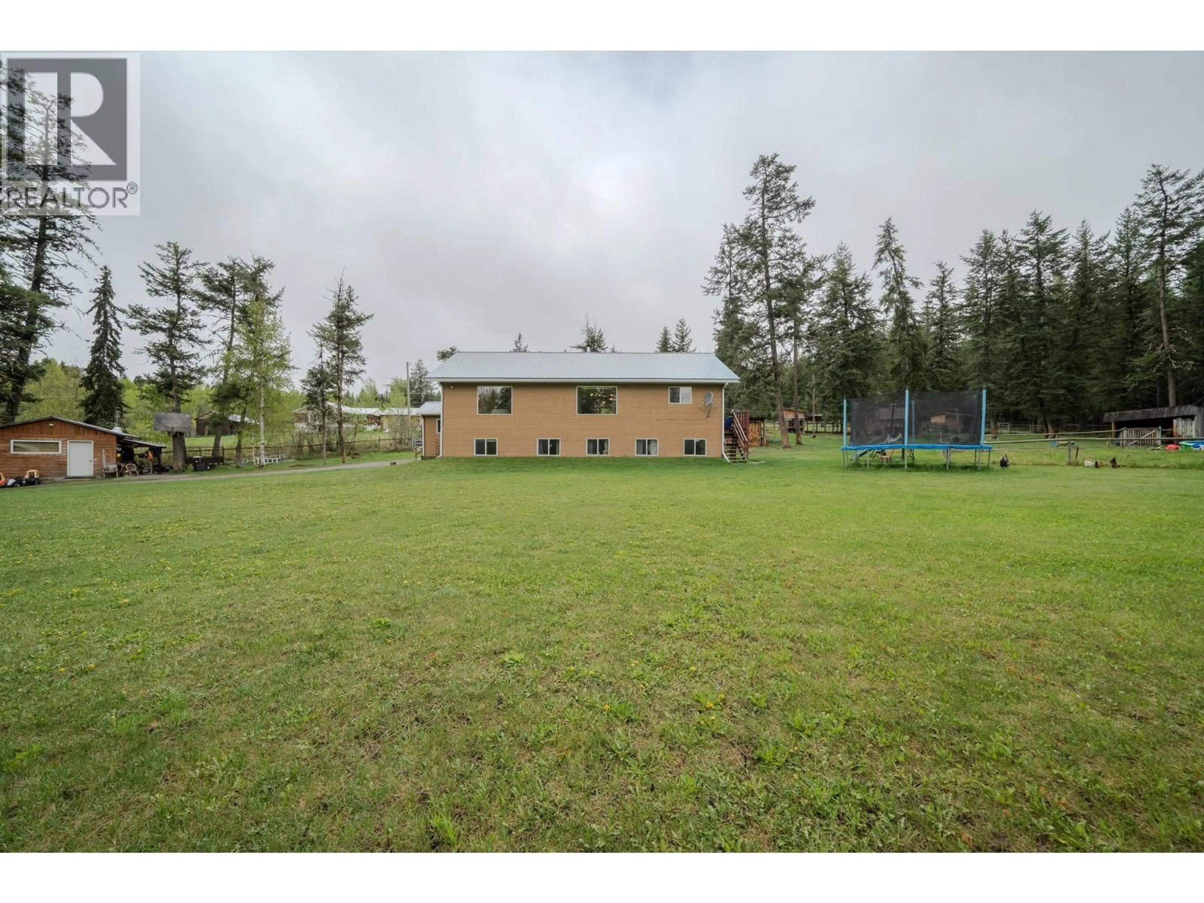 A pic from outside/outdoor area/front of a property/back of a property/a pic from drone, building for 1449 ENRIGHT ROAD, McLeese Lake British Columbia V0L1P0