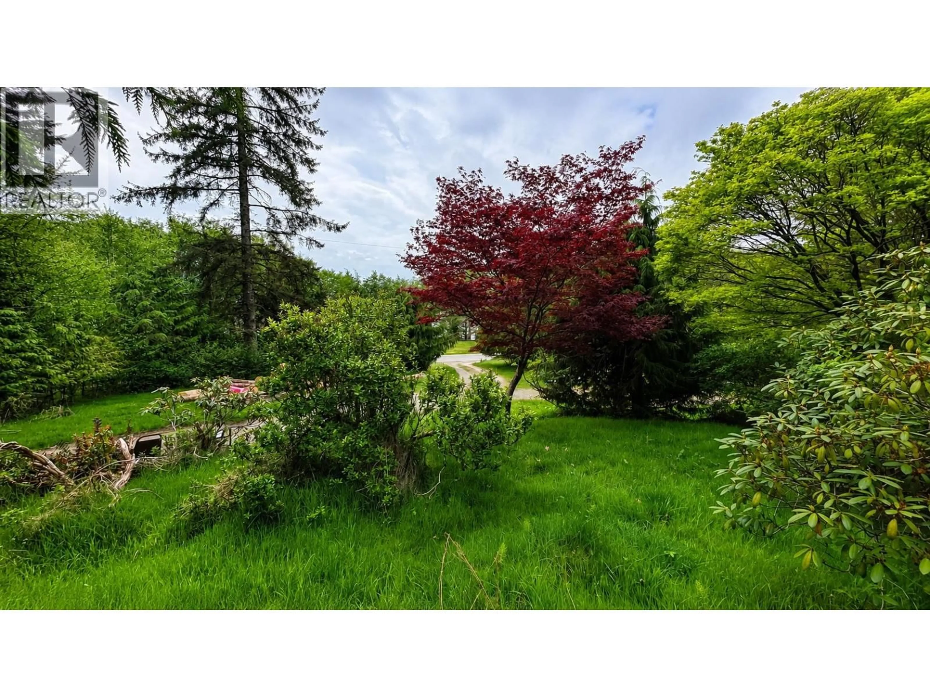 A pic from outside/outdoor area/front of a property/back of a property/a pic from drone, forest/trees view for 252 BAYVIEW DRIVE, Port Clements British Columbia V0T1R0