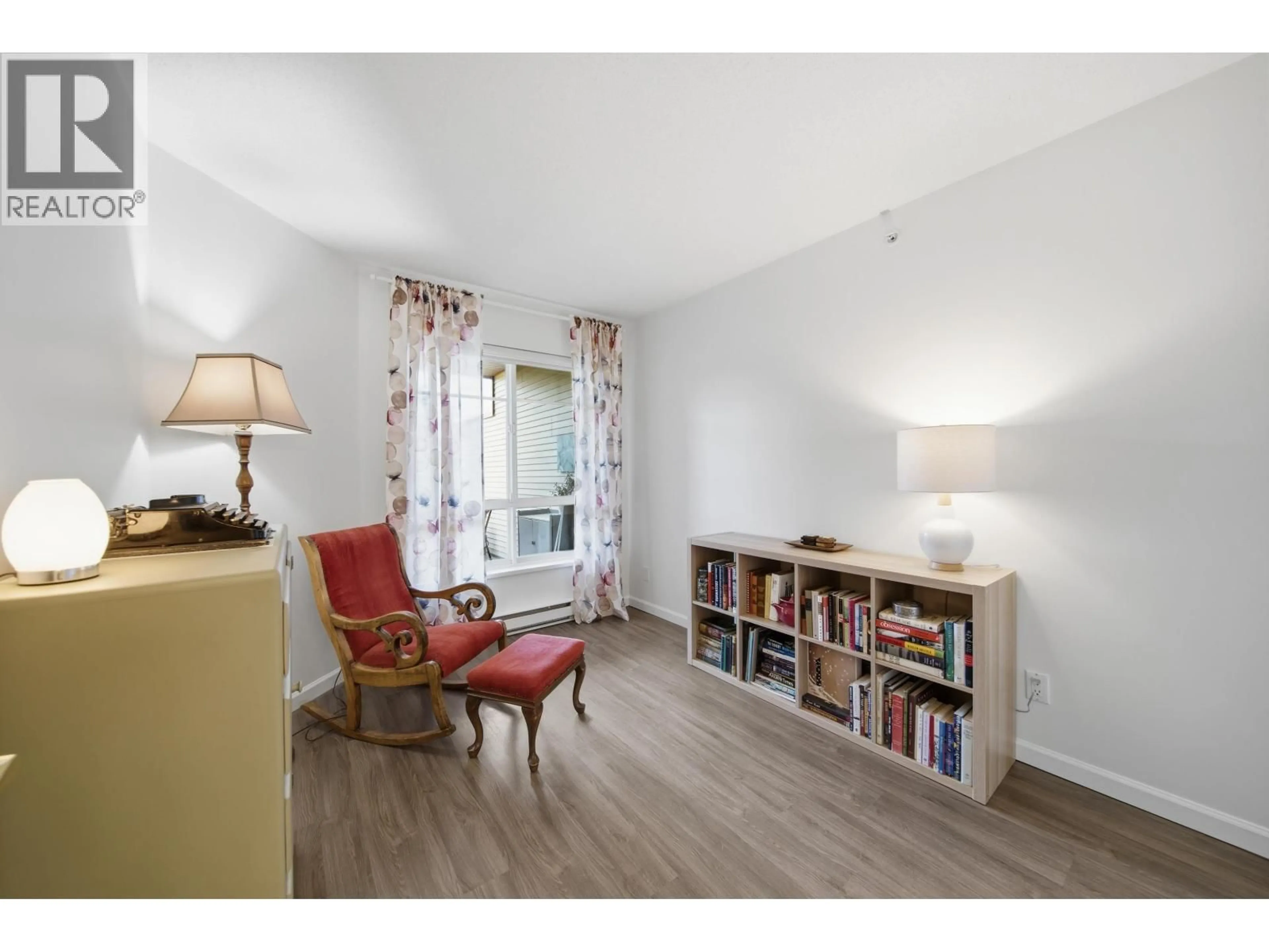 Living room with furniture, wood/laminate floor for 434 - 5600 ANDREWS ROAD, Richmond British Columbia V7E6N1