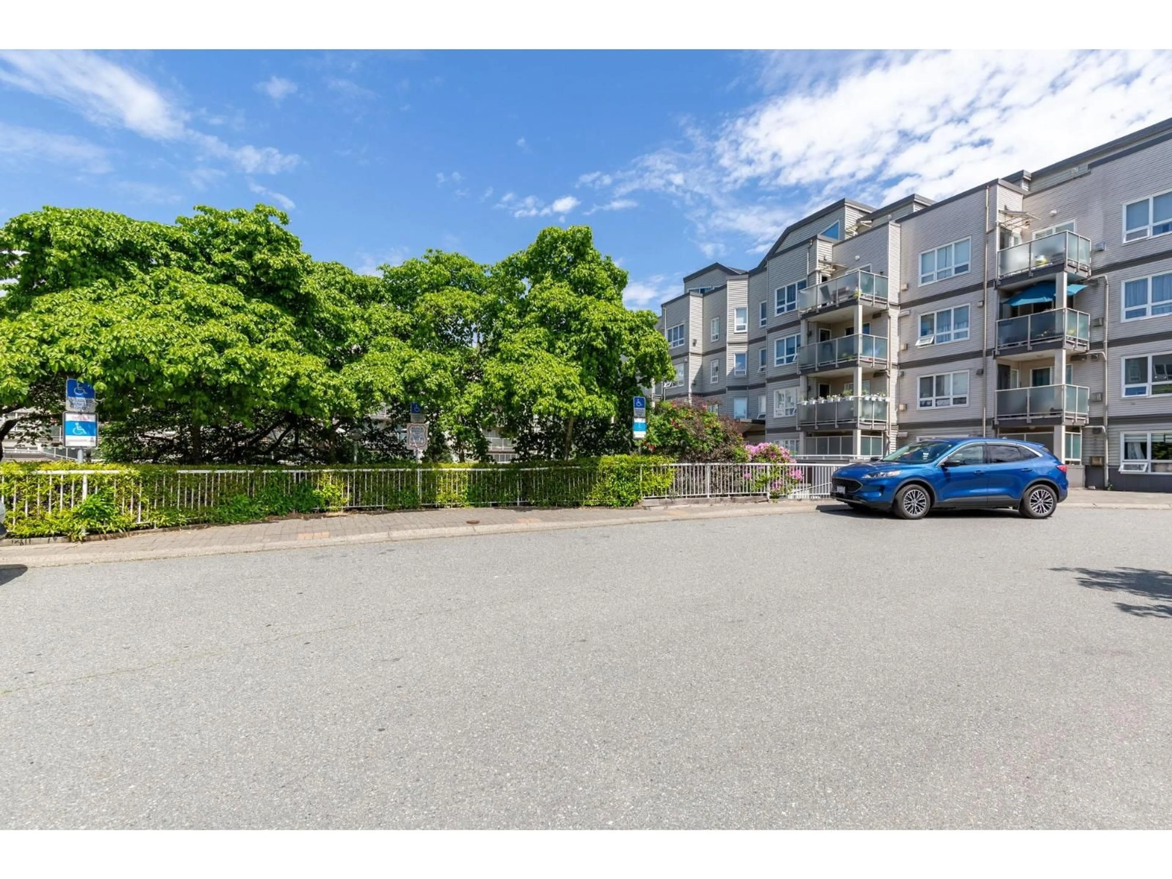 A pic from outside/outdoor area/front of a property/back of a property/a pic from drone, street for 412 - 14399 103 AVENUE, Surrey British Columbia V3T5V5