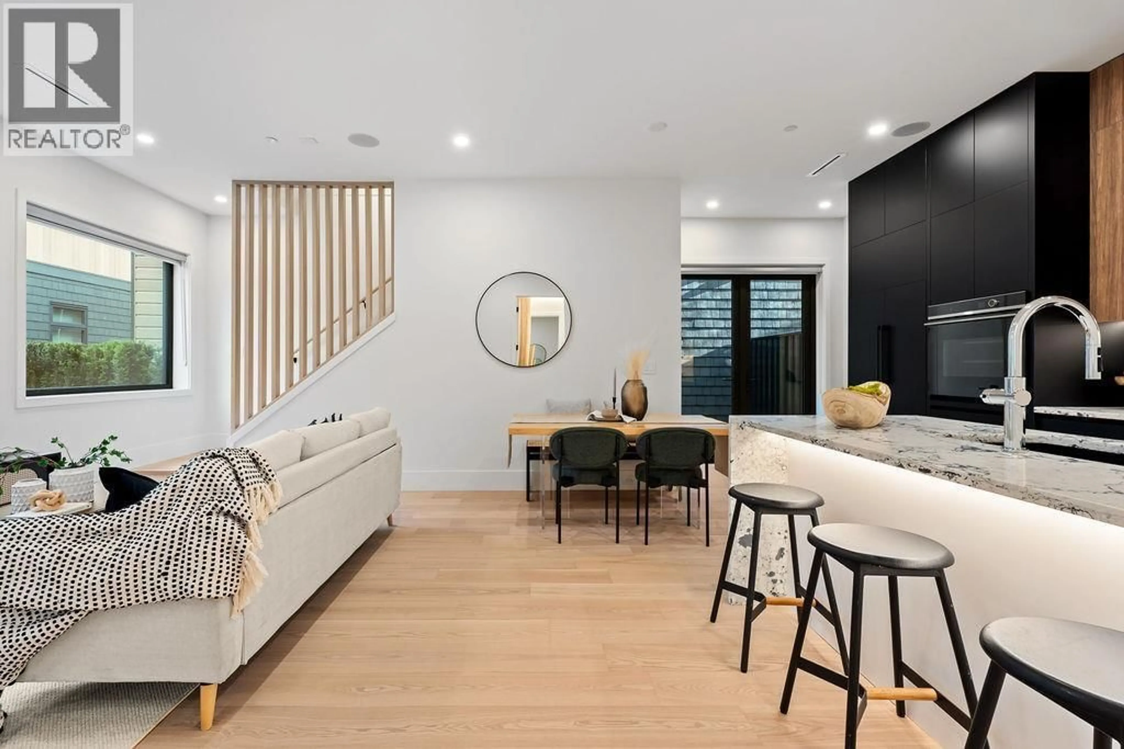 Living room with furniture, wood/laminate floor for 2 - 5034 GRANVILLE STREET, Vancouver British Columbia V6M3B4