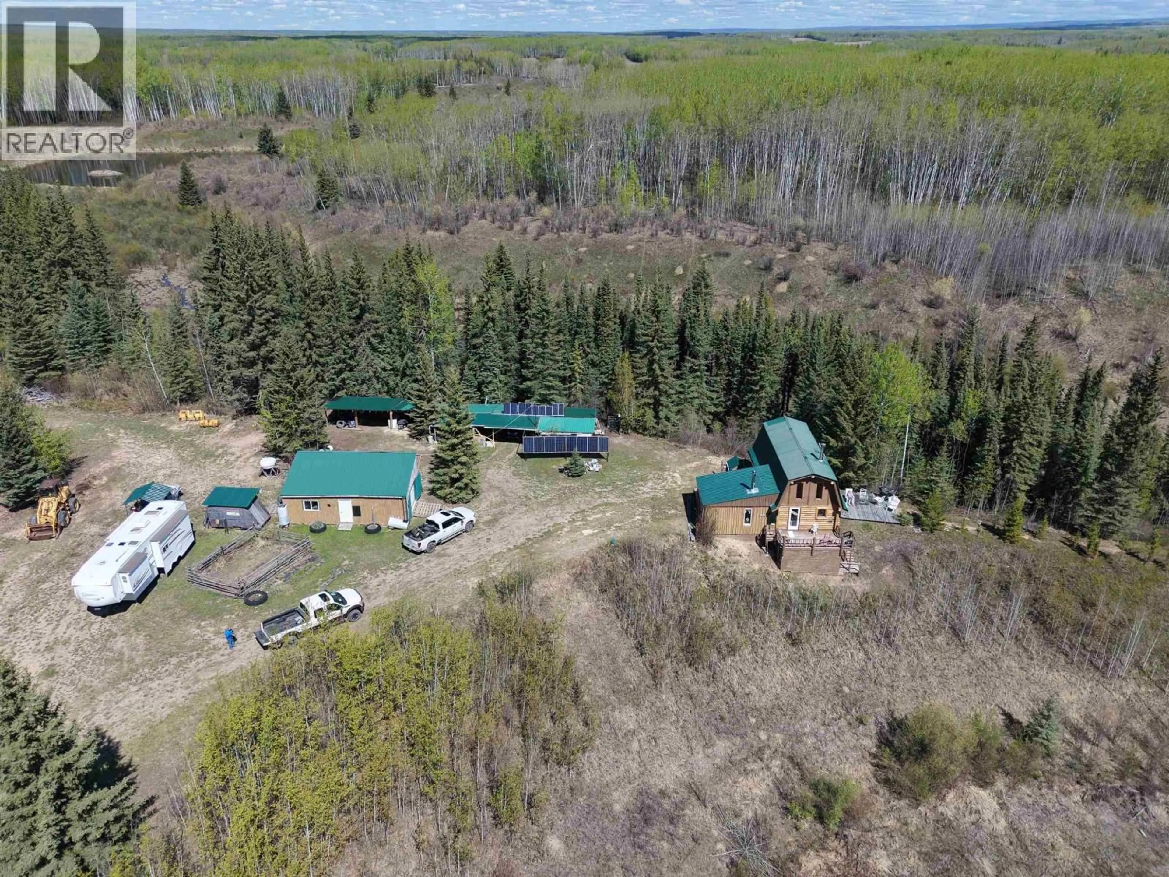 A pic from outside/outdoor area/front of a property/back of a property/a pic from drone, unknown for 14203 217 ROAD, Goodlow British Columbia V0C1S0