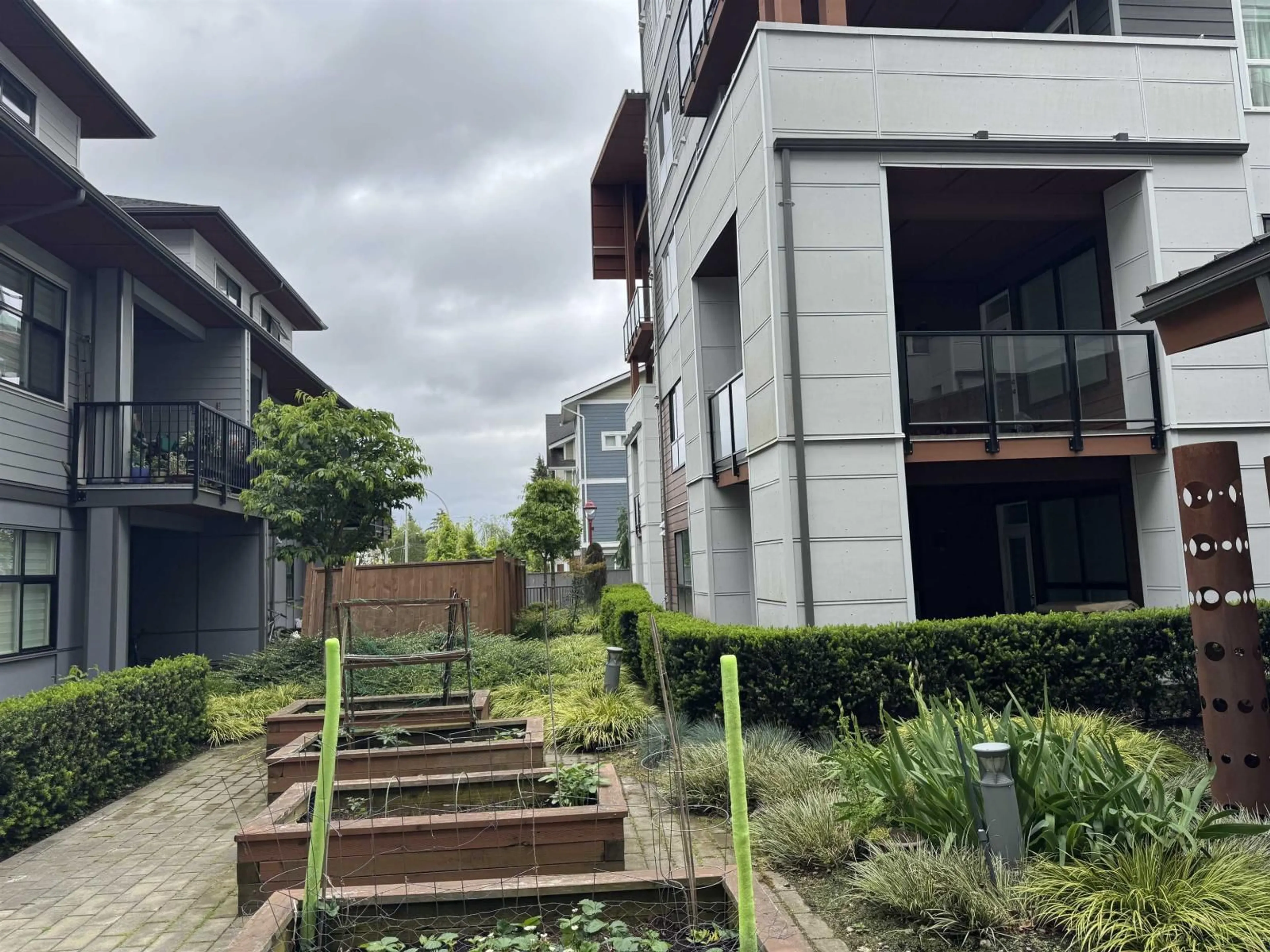 A pic from outside/outdoor area/front of a property/back of a property/a pic from drone, building for 218 - 11507 84 AVENUE, Delta British Columbia V4C0E5