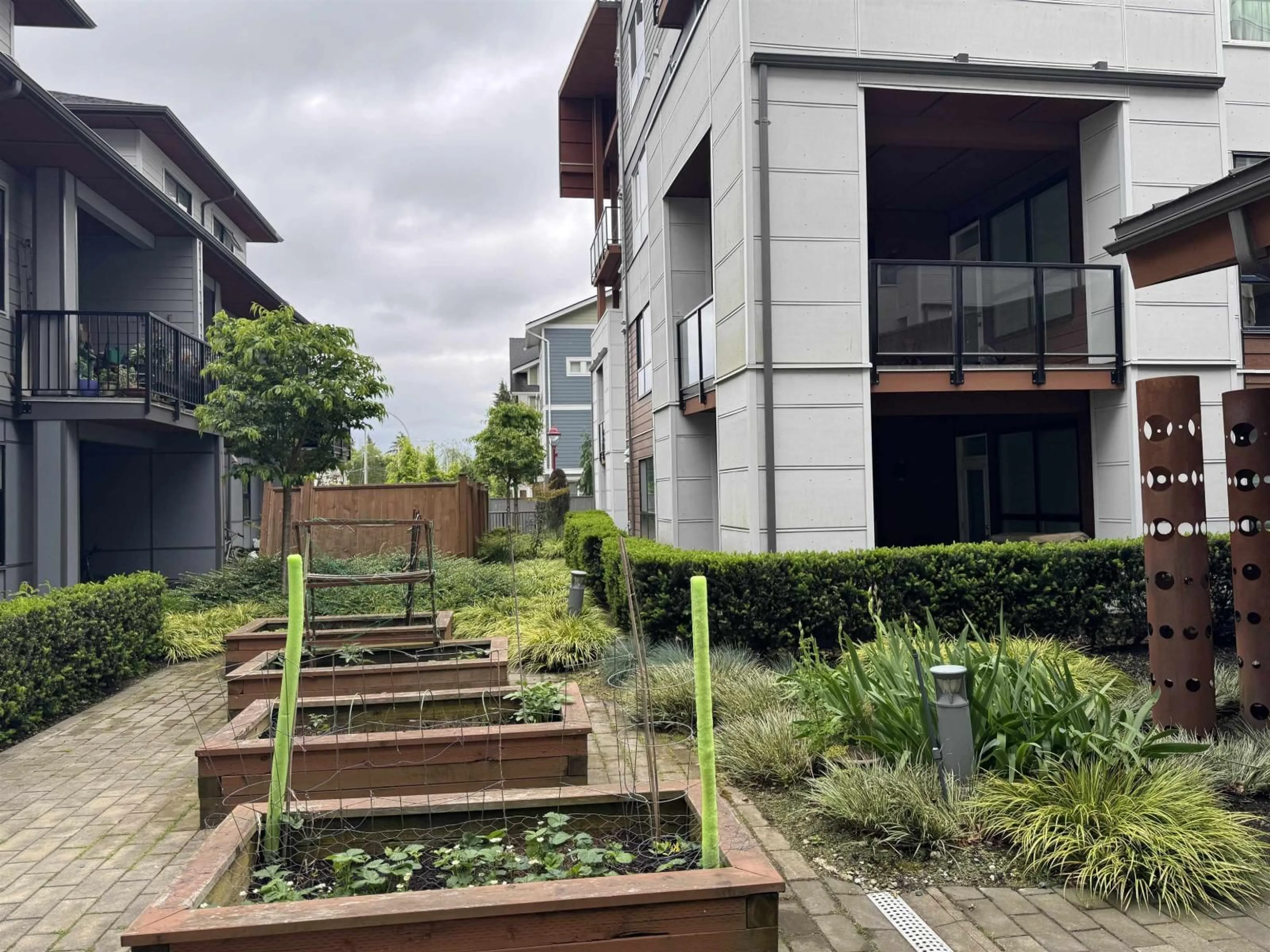 A pic from outside/outdoor area/front of a property/back of a property/a pic from drone, street for 218 - 11507 84 AVENUE, Delta British Columbia V4C0E5