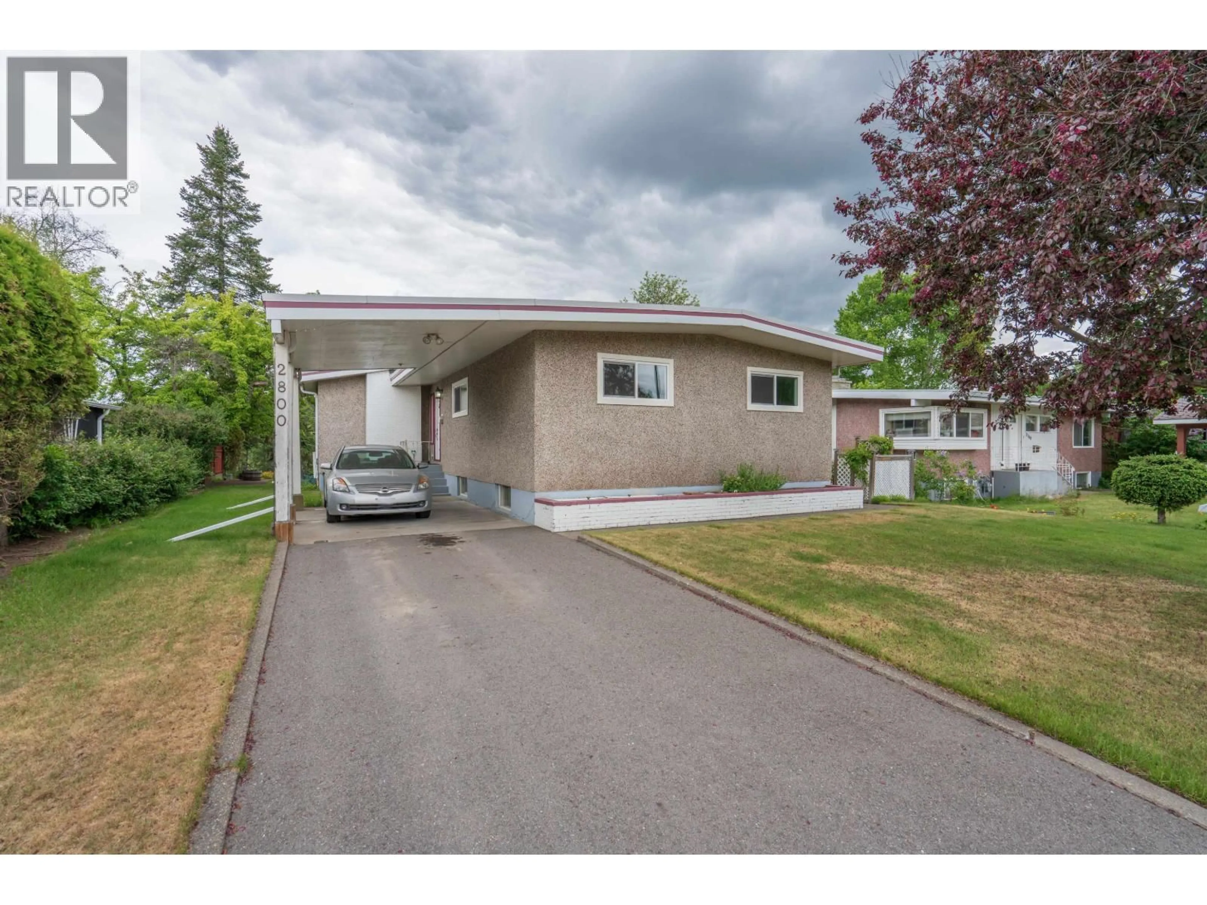 Home with vinyl exterior material, street for 2800 HAMMOND AVENUE, Prince George British Columbia V2M1A5