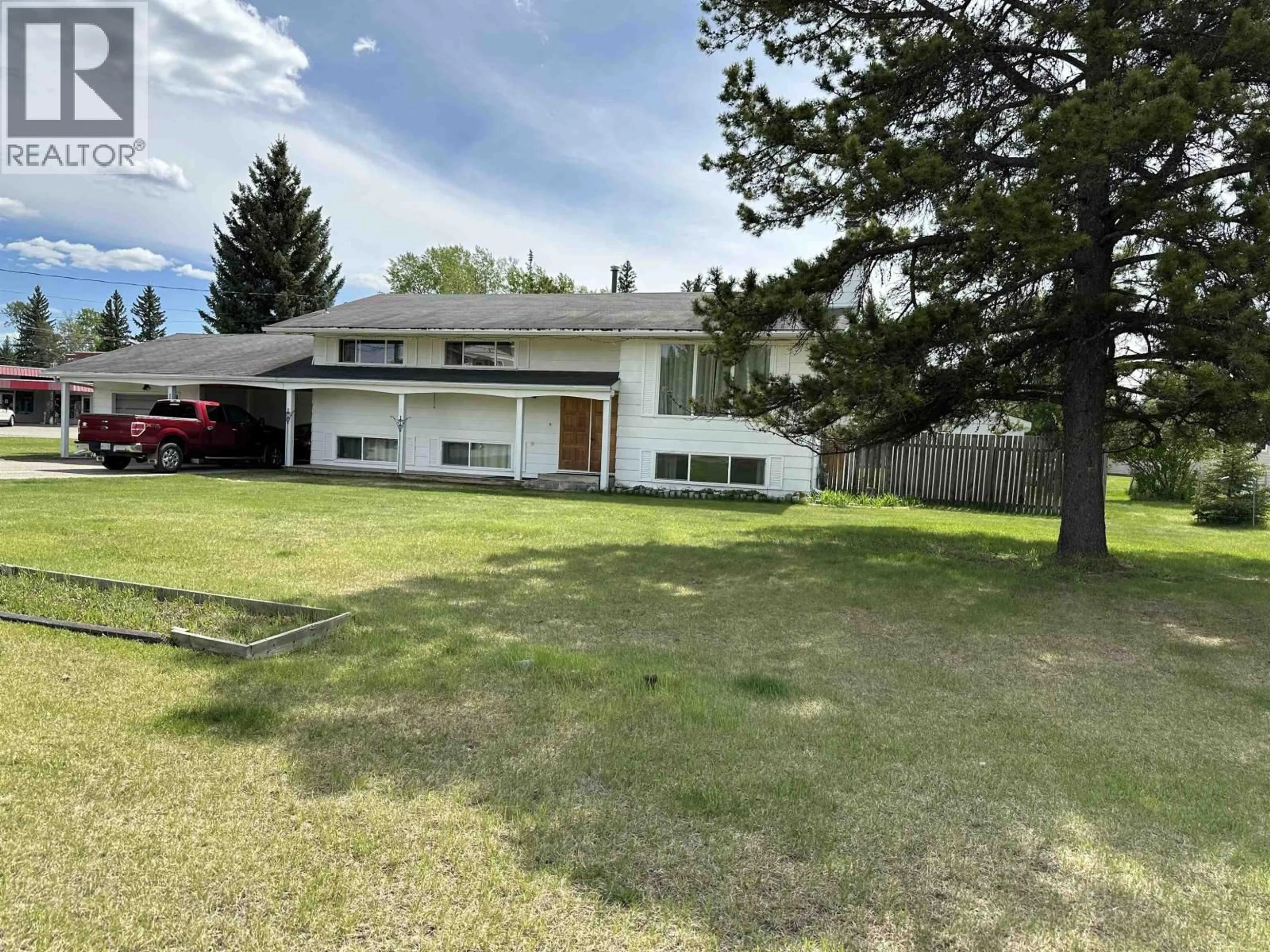 A pic from outside/outdoor area/front of a property/back of a property/a pic from drone, street for 10102 PAQUETTE AVENUE, Hudsons Hope British Columbia V0C1V0