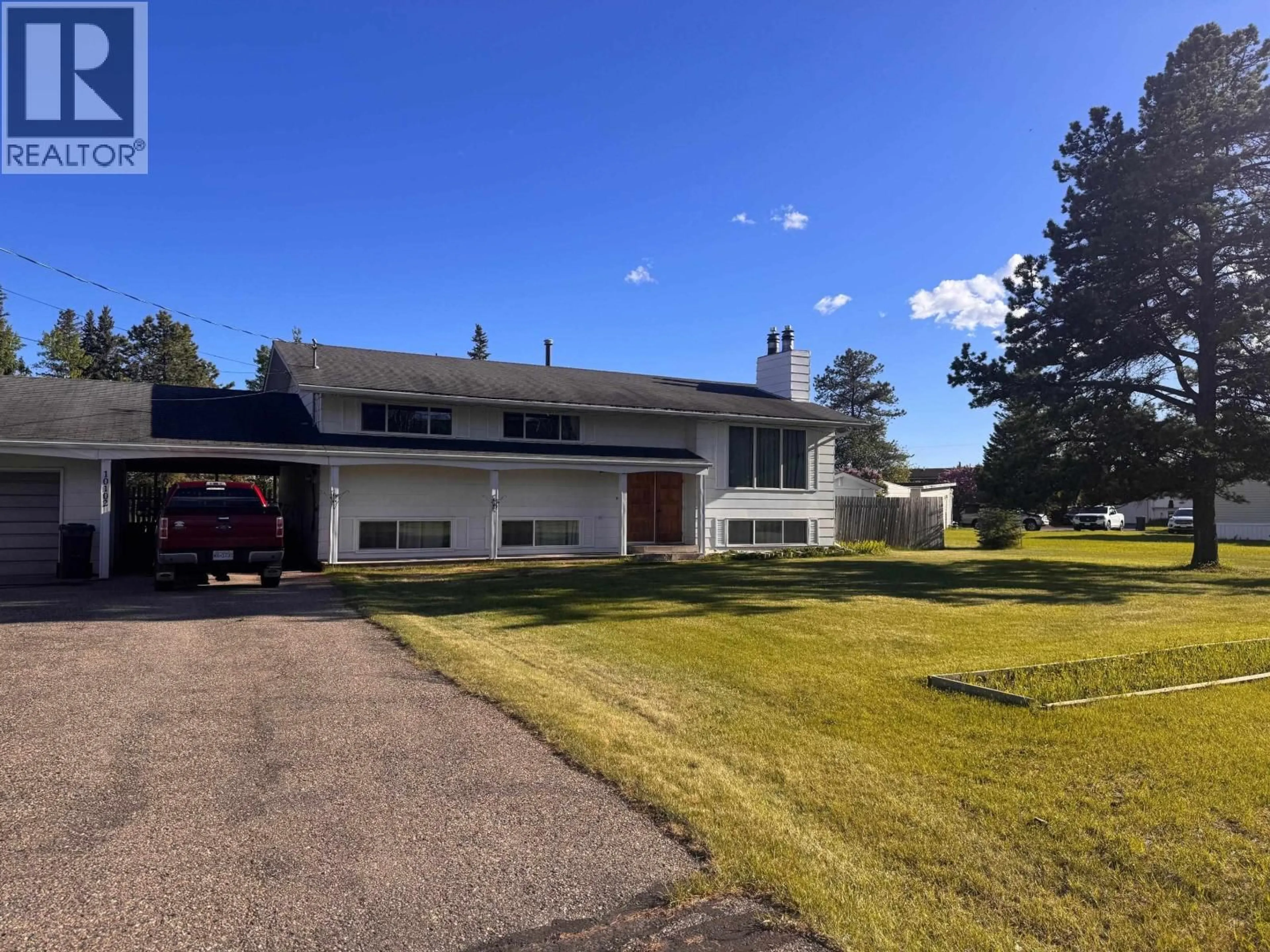 A pic from outside/outdoor area/front of a property/back of a property/a pic from drone, street for 10102 PAQUETTE AVENUE, Hudsons Hope British Columbia V0C1V0