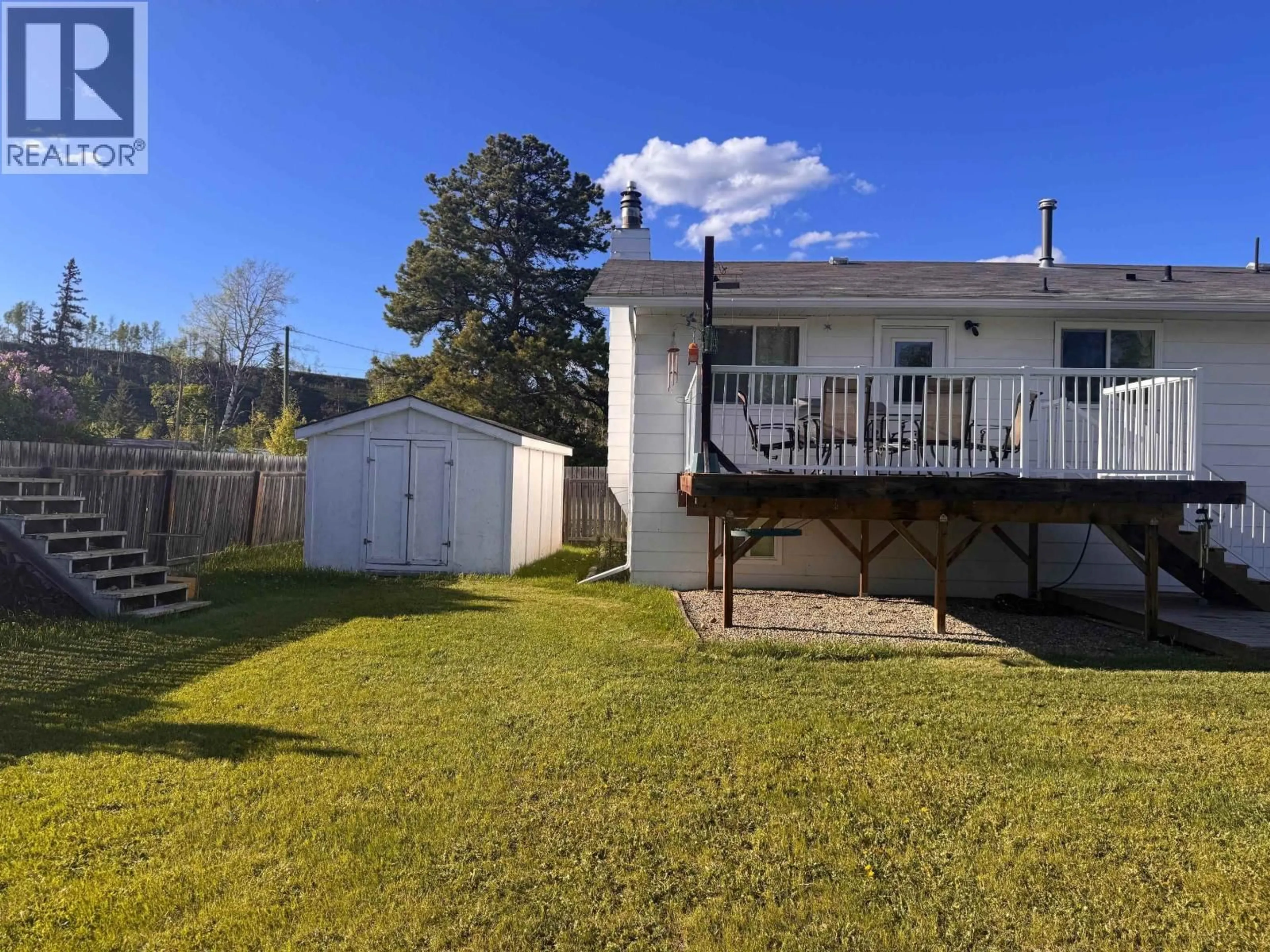 A pic from outside/outdoor area/front of a property/back of a property/a pic from drone, unknown for 10102 PAQUETTE AVENUE, Hudsons Hope British Columbia V0C1V0