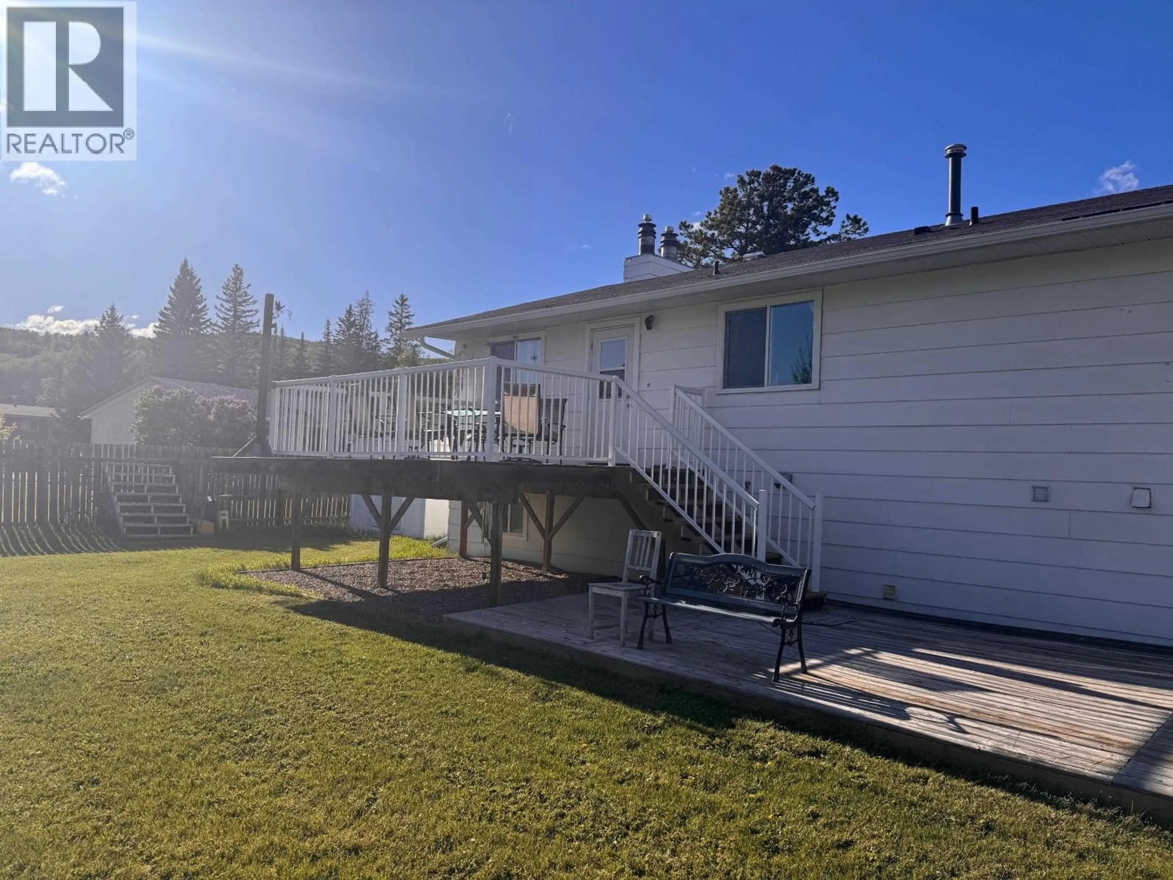 A pic from outside/outdoor area/front of a property/back of a property/a pic from drone, water/lake/river/ocean view for 10102 PAQUETTE AVENUE, Hudsons Hope British Columbia V0C1V0