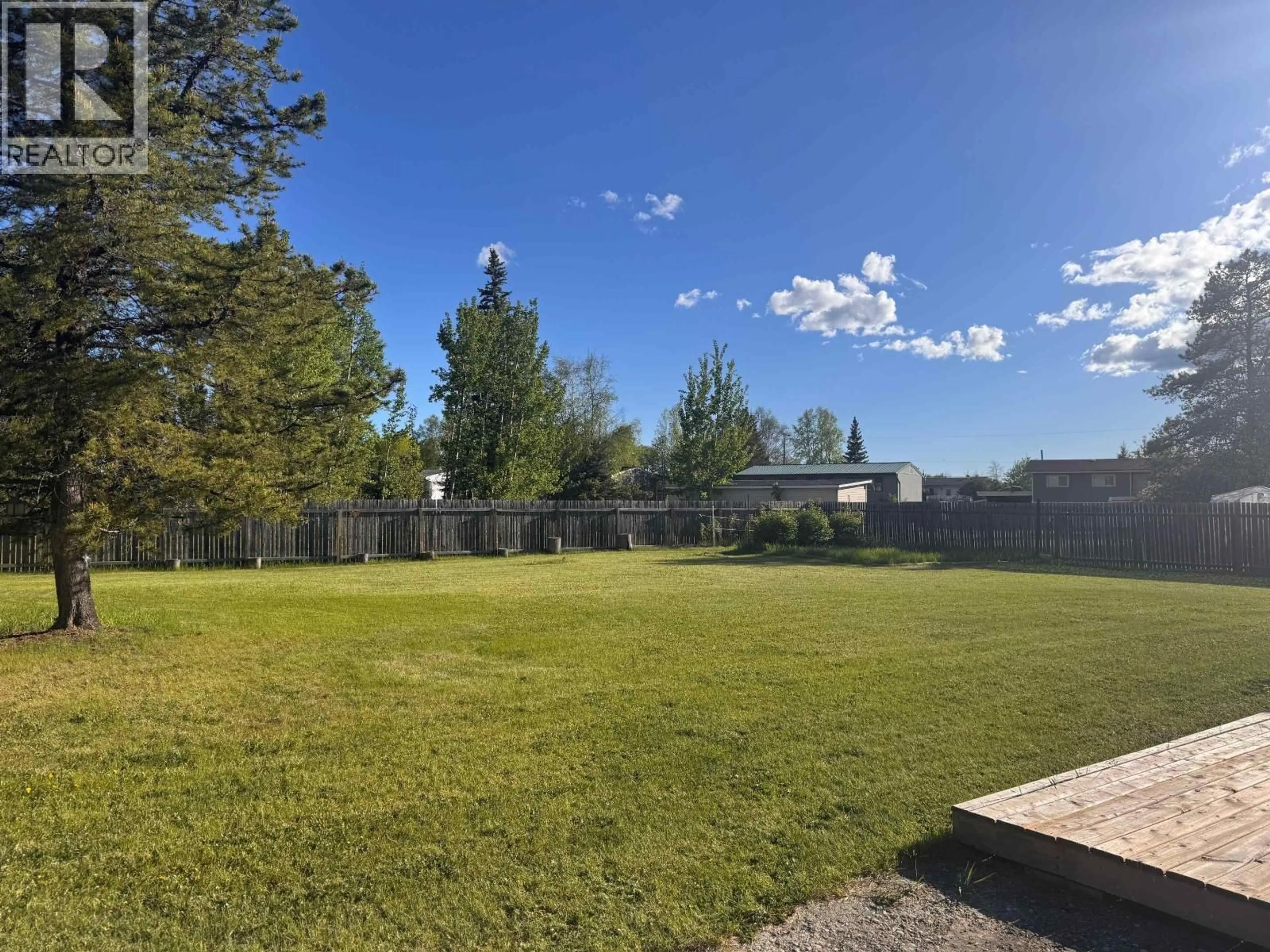 A pic from outside/outdoor area/front of a property/back of a property/a pic from drone, mountain view for 10102 PAQUETTE AVENUE, Hudsons Hope British Columbia V0C1V0
