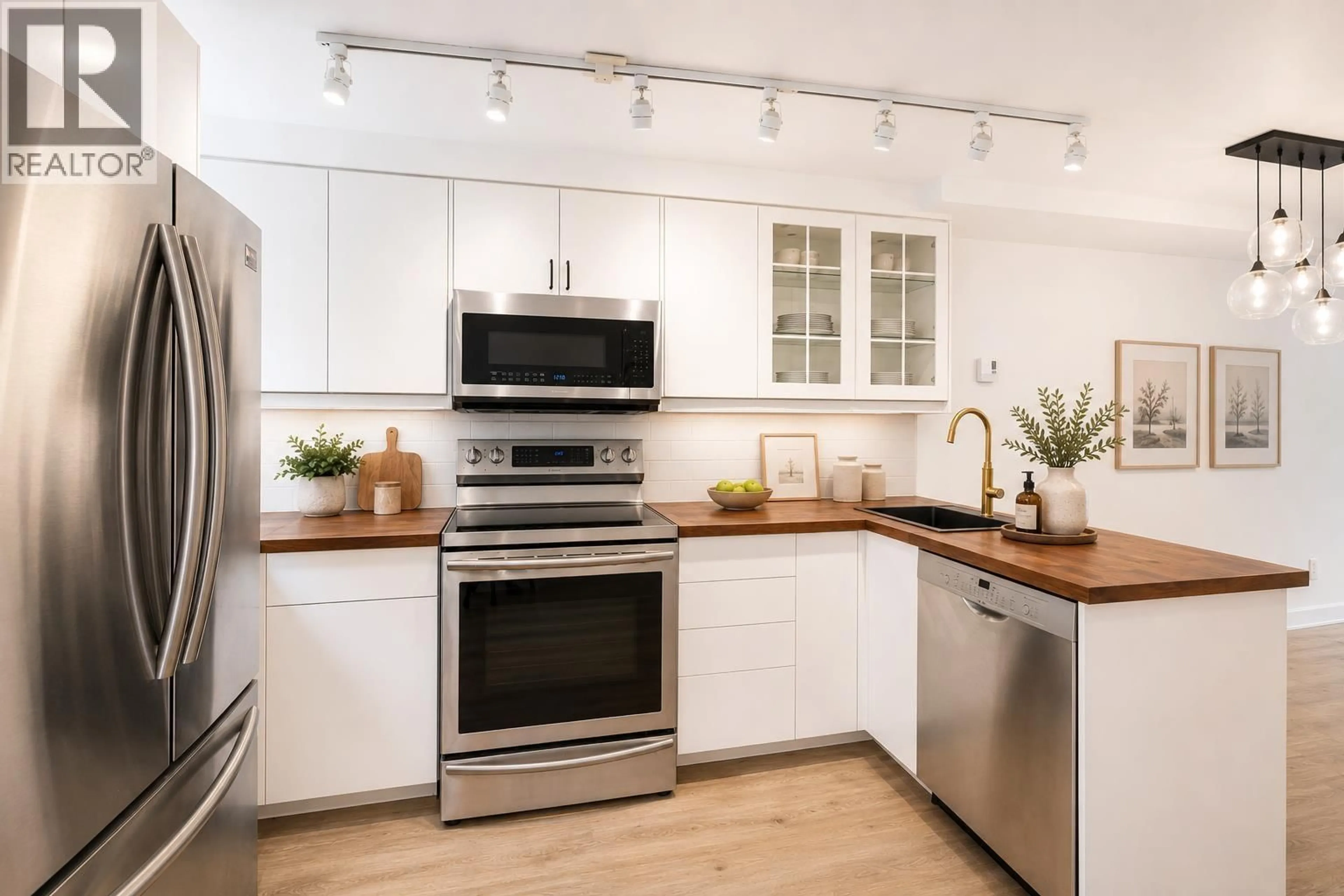 Open concept kitchen, unknown for 112 - 1363 CLYDE AVENUE, West Vancouver British Columbia V7T2W9