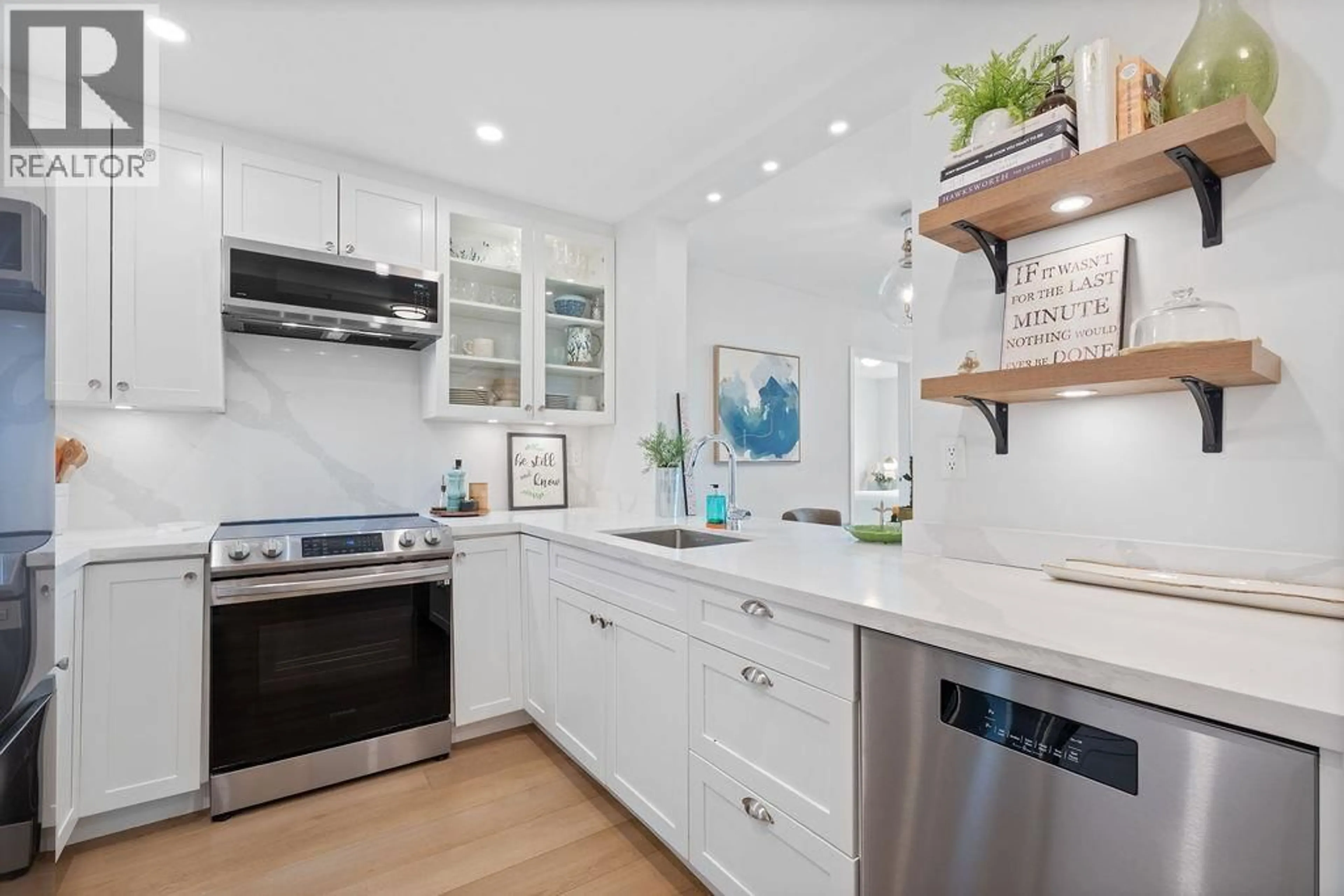 Contemporary kitchen, ceramic/tile floor for 404 - 12639 NO. 2 ROAD, Richmond British Columbia V7E6N6
