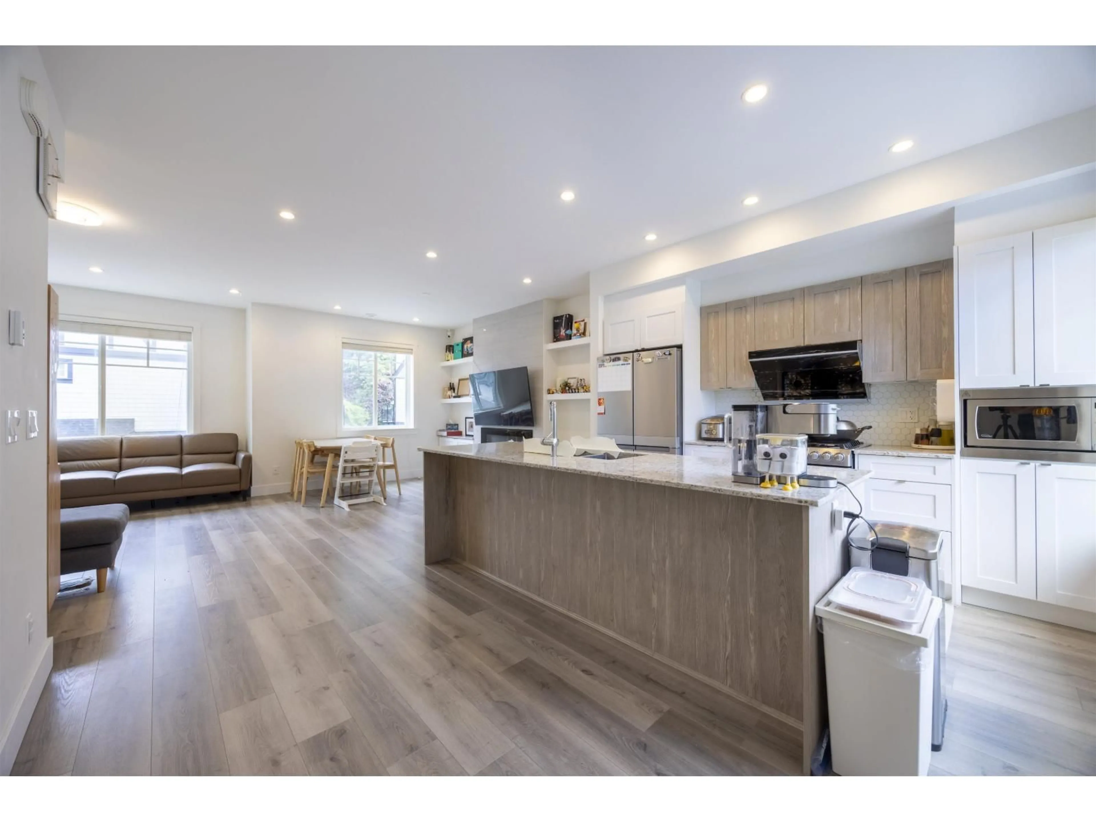 Open concept kitchen, wood/laminate floor for 50 - 11188 72 AVENUE, Delta British Columbia V4E0A5