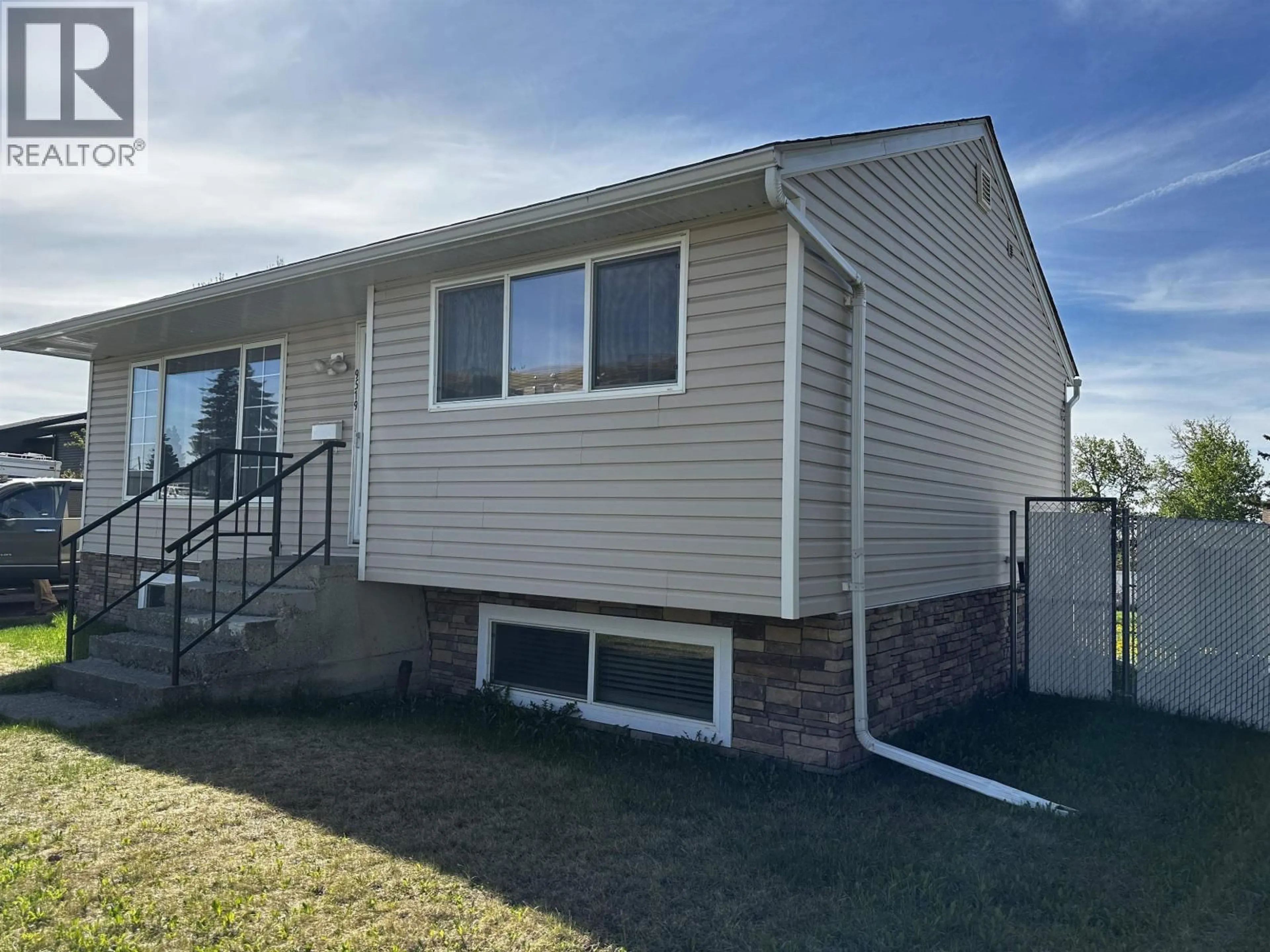 Home with vinyl exterior material, unknown for 9519 99 AVENUE, Fort St. John British Columbia V1J1T5