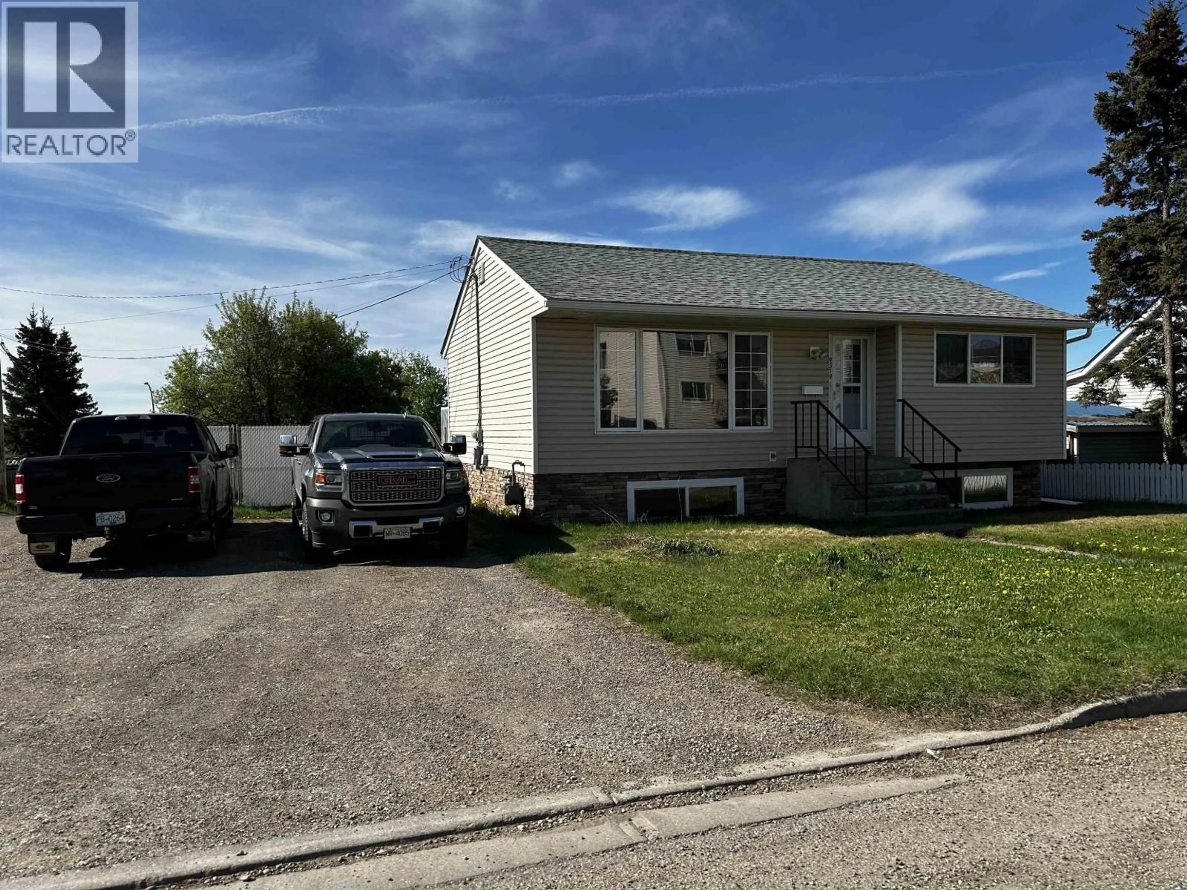 Home with vinyl exterior material, street for 9519 99 AVENUE, Fort St. John British Columbia V1J1T5