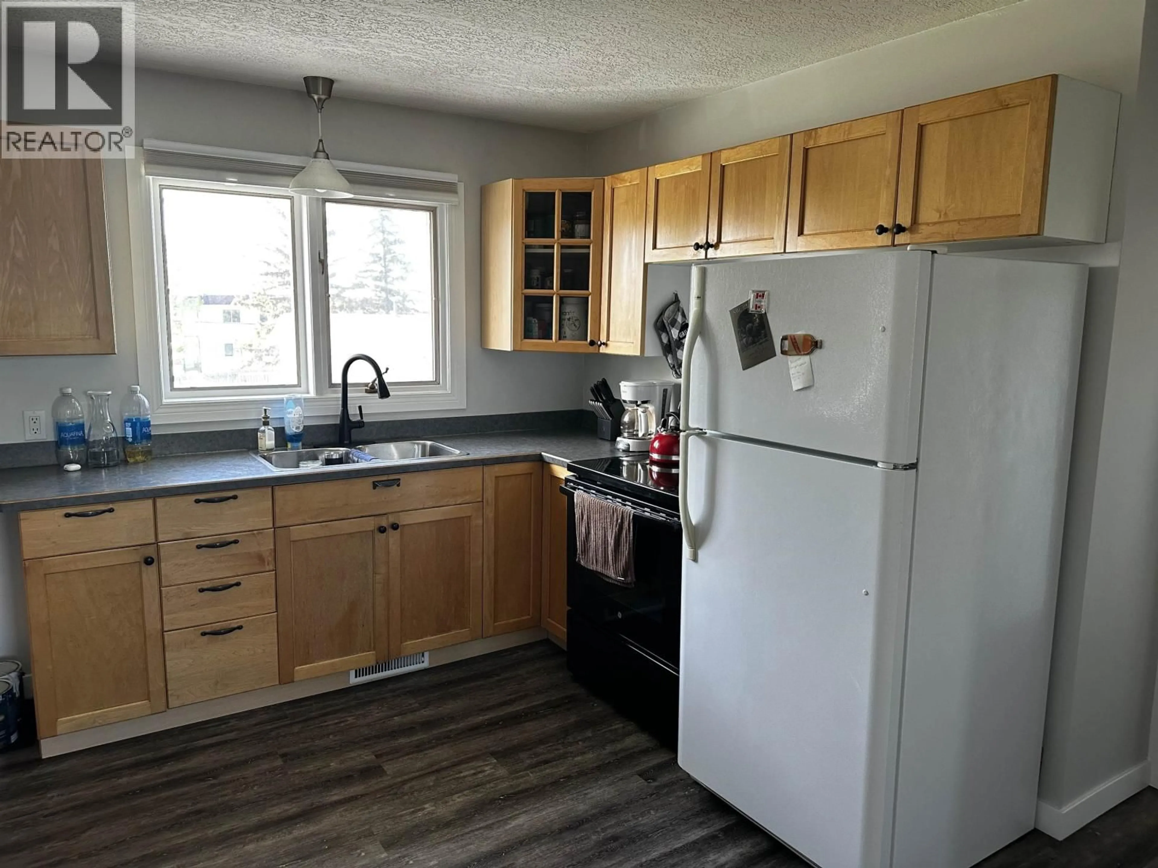 Standard kitchen, wood/laminate floor for 9519 99 AVENUE, Fort St. John British Columbia V1J1T5