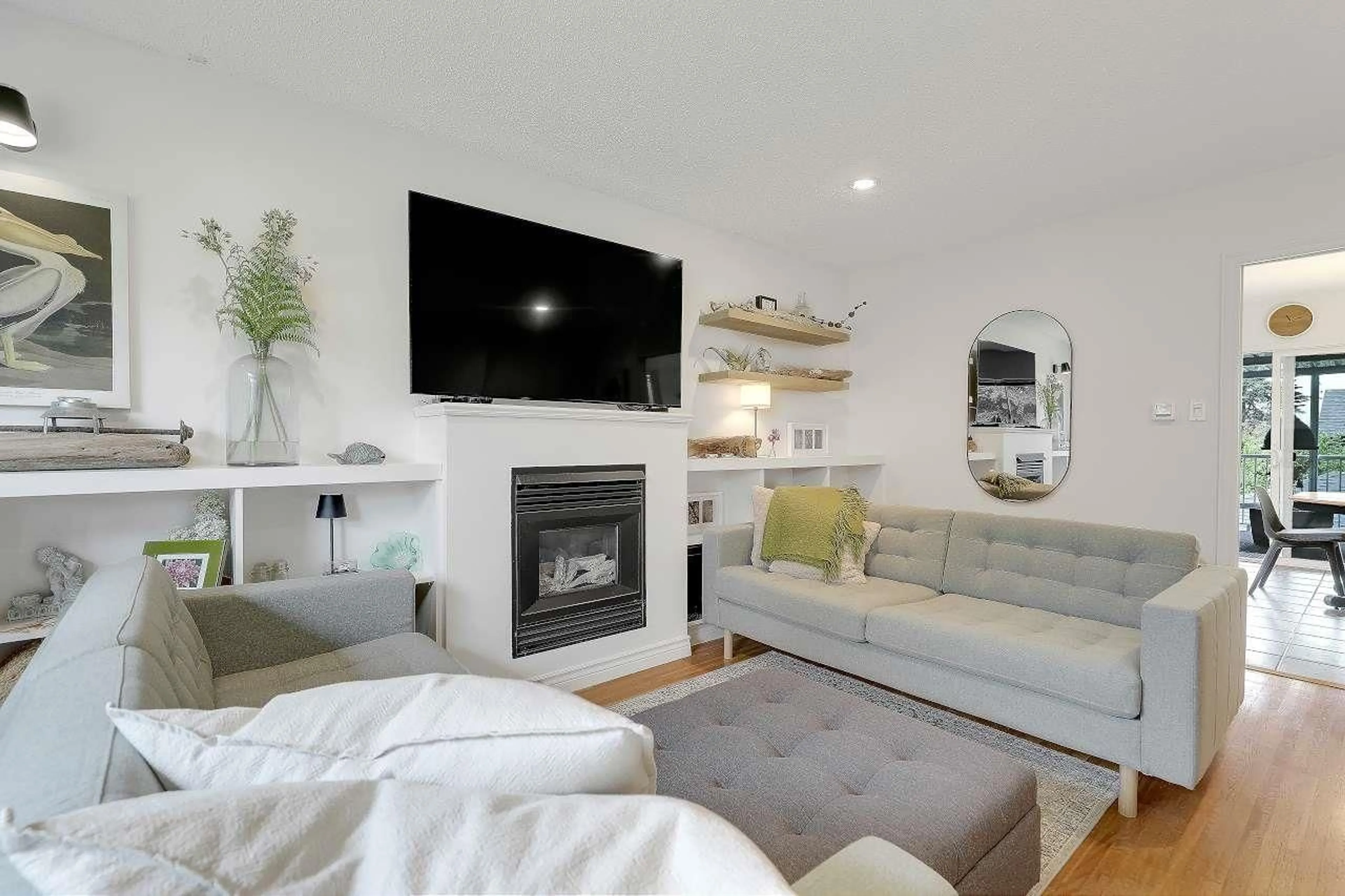 Living room with furniture, wood/laminate floor for 8257 114 STREET, Delta British Columbia V4C5J5
