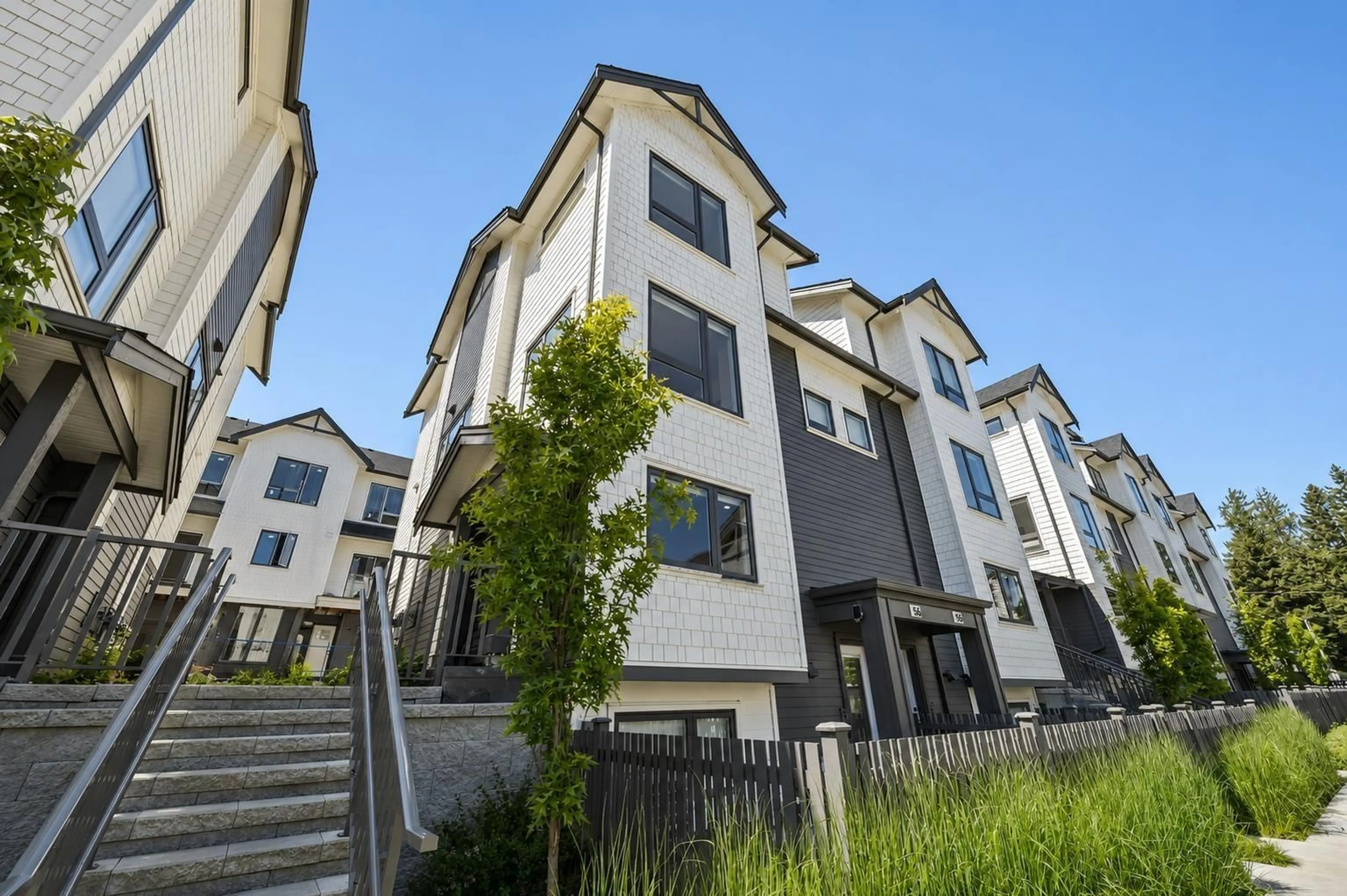 A pic from outside/outdoor area/front of a property/back of a property/a pic from drone, street for 56 - 16358 90 AVENUE, Surrey British Columbia V4N4T2