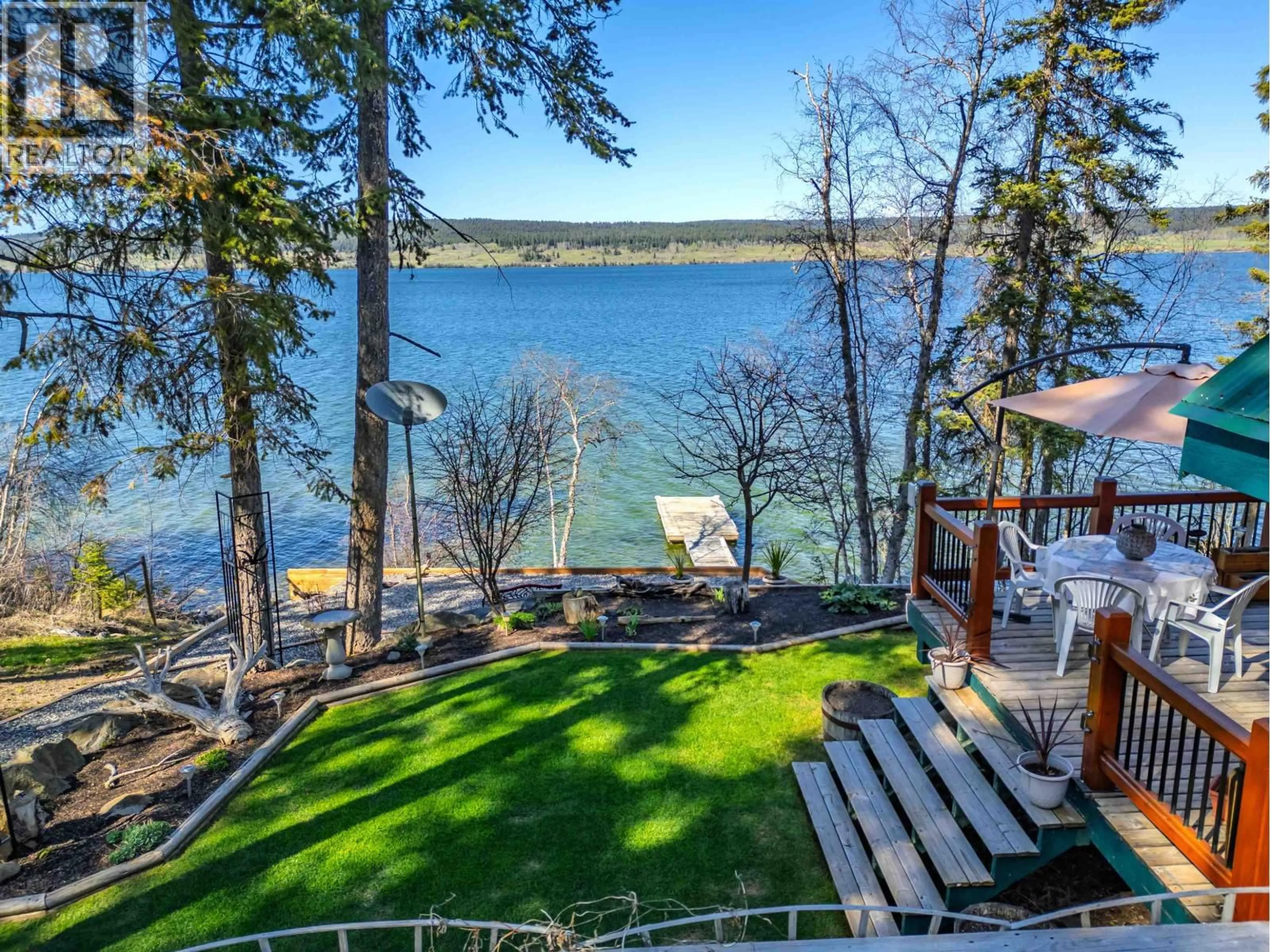 A pic from outside/outdoor area/front of a property/back of a property/a pic from drone, water/lake/river/ocean view for 4677 CAVERLY ROAD, Lac La Hache British Columbia V0K1T0